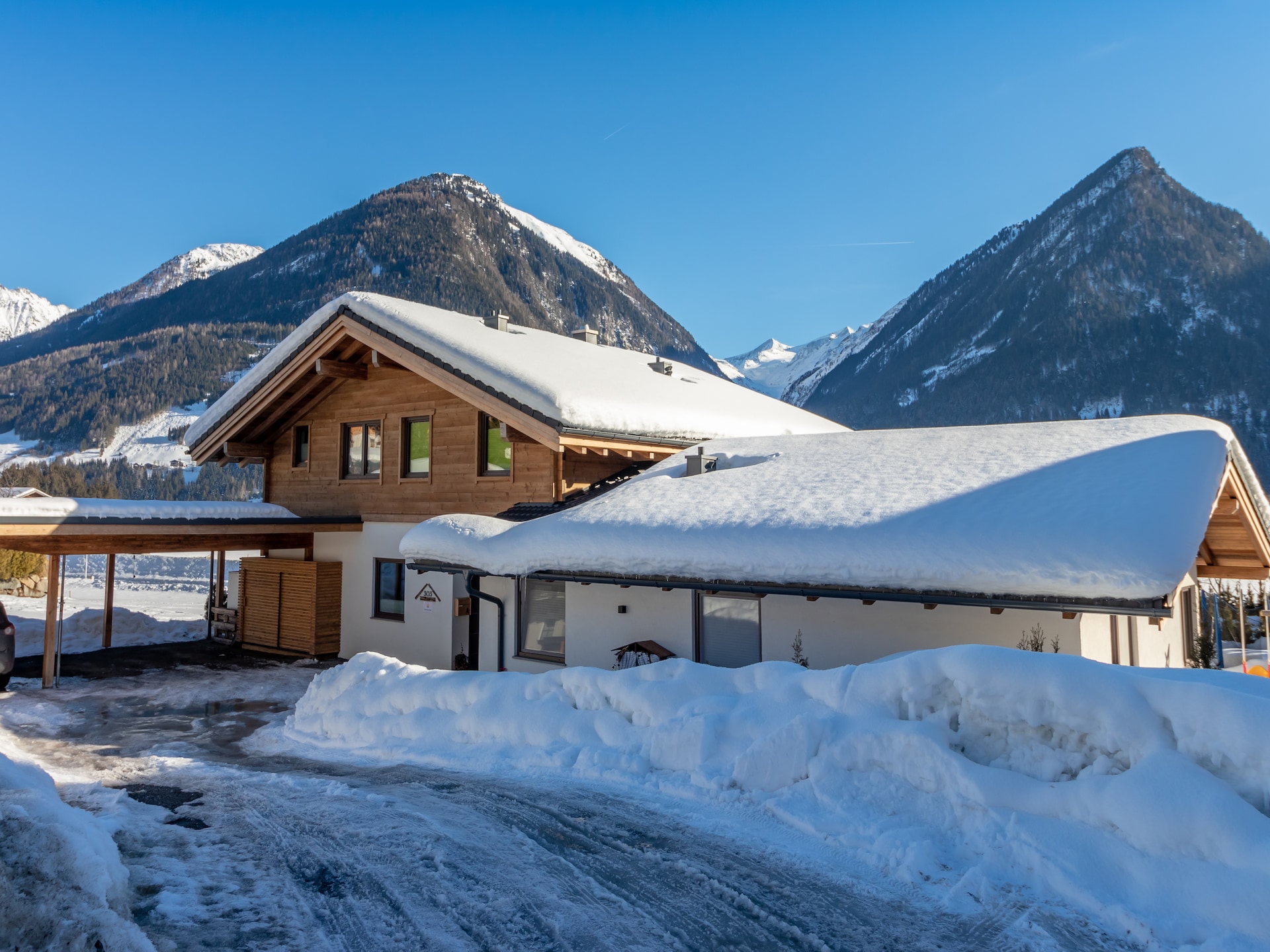 Op 300 m van de piste: Luxe chalet met privézwembad in Neukirchen - foto 31