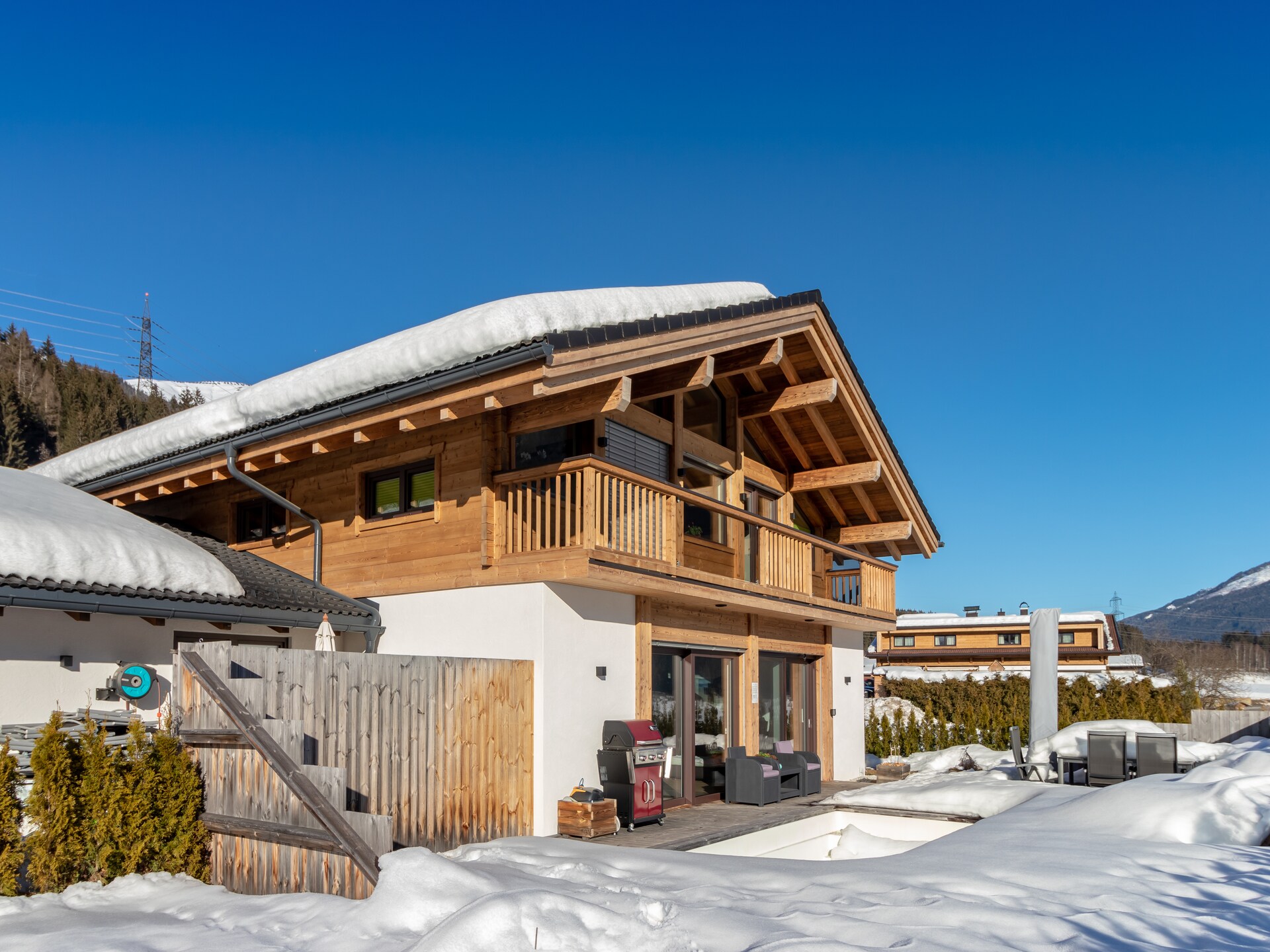 Op 300 m van de piste: Luxe chalet met privézwembad in Neukirchen - foto 30