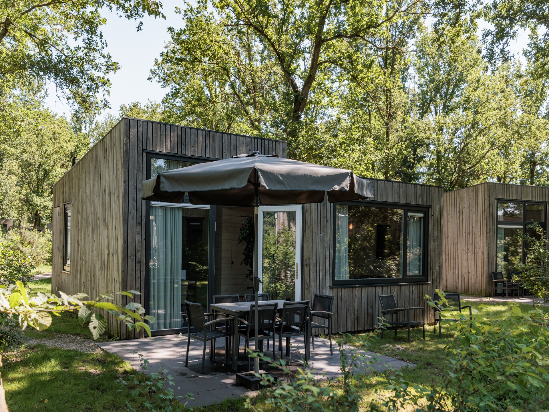 Moderne 6-persoons lodge met tuin in bosrijk Schaijk - foto 8
