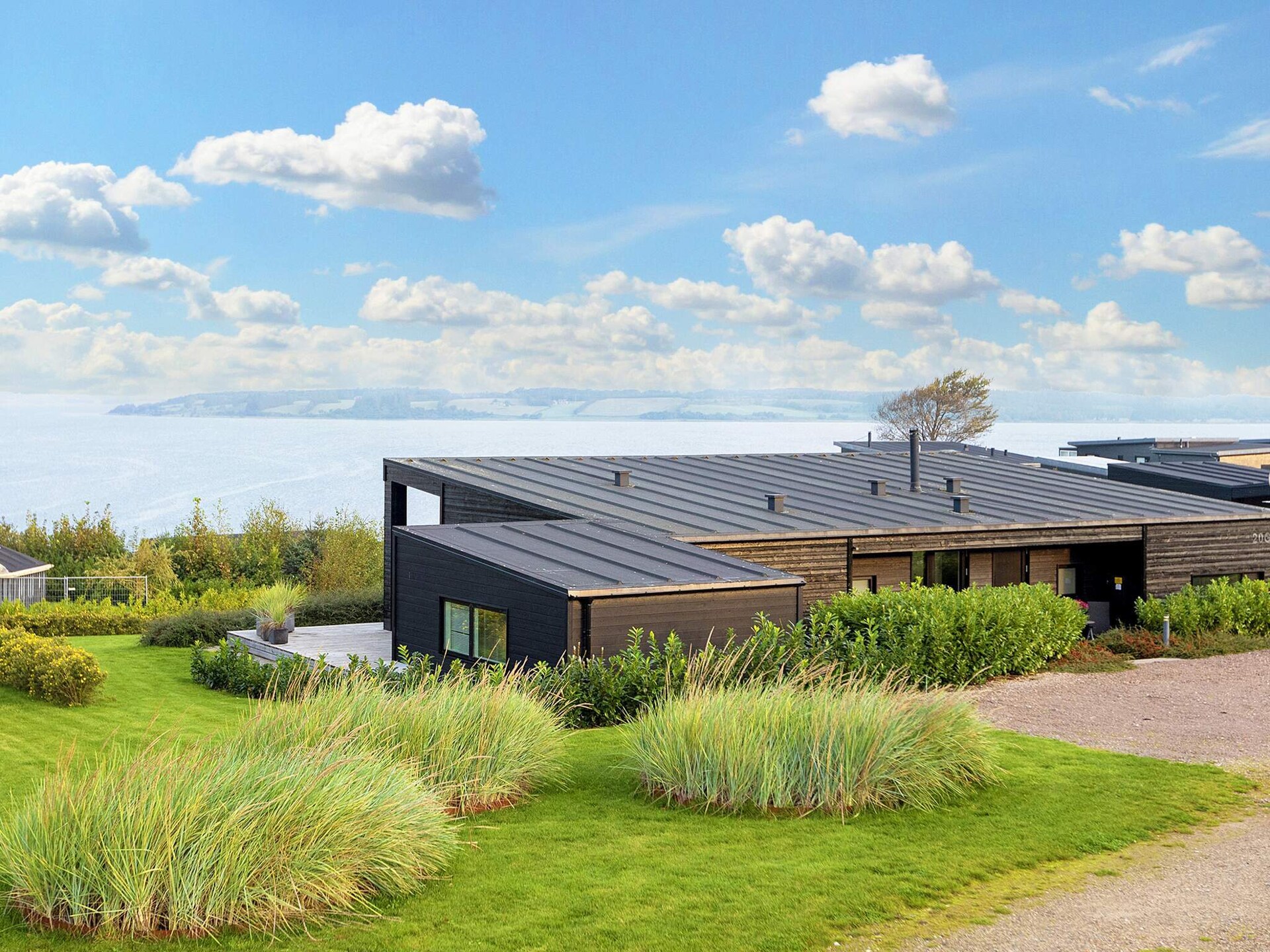 Aan zee: Modern vakantiehuis met fjordzicht in Løgstrup - foto 4