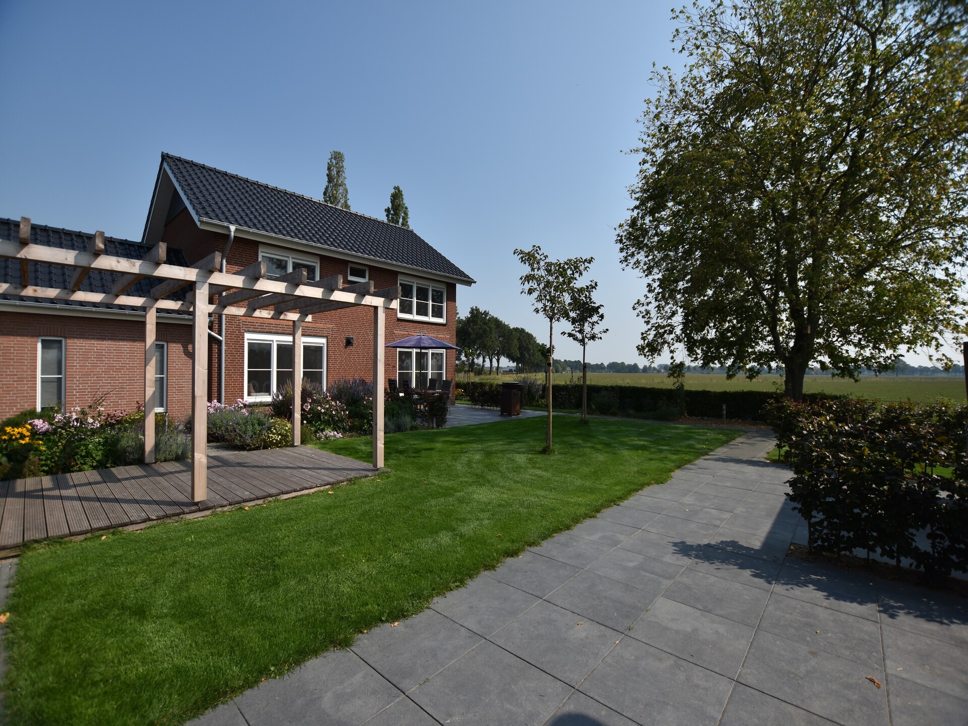 Villa Grenszicht: luxe villa met hottub, sauna en ruime tuin in Gelderland - foto 11