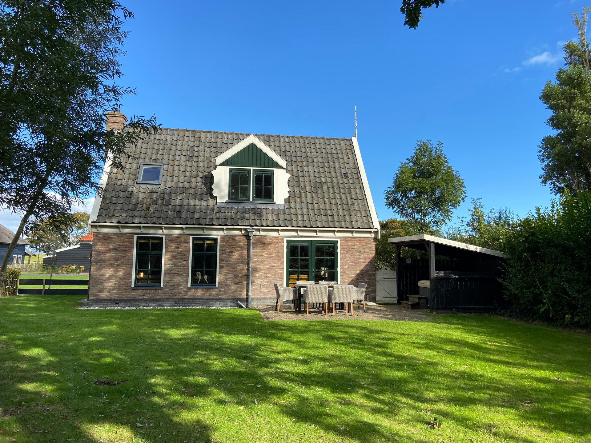 Luxe vrijstaande villa met jacuzzi op rustig vakantiepark in Noord-Holland - foto 14