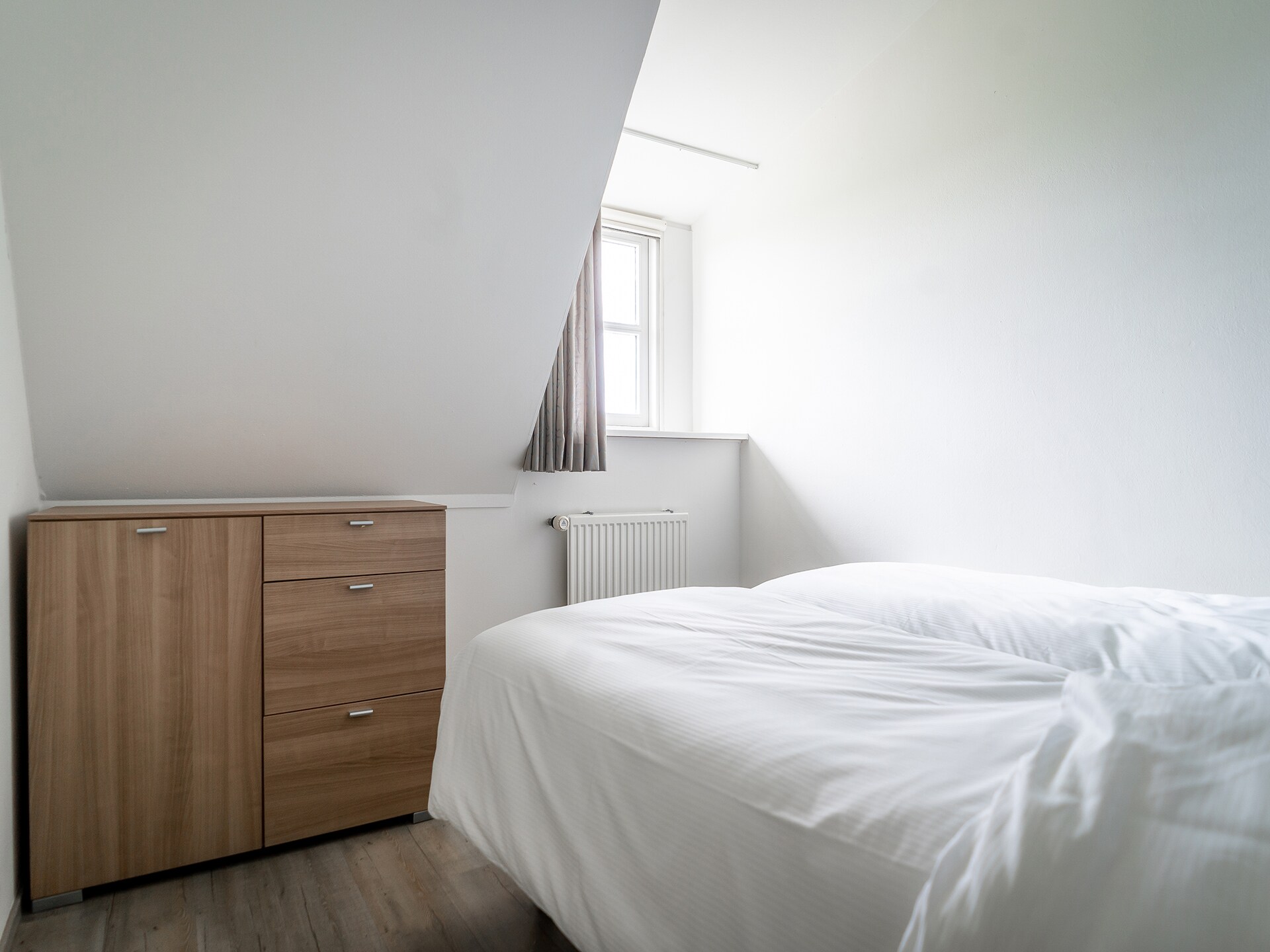 Knus hoekappartement in historische stolpboerderij op Texel, nabij bos en golfbaan - foto 16
