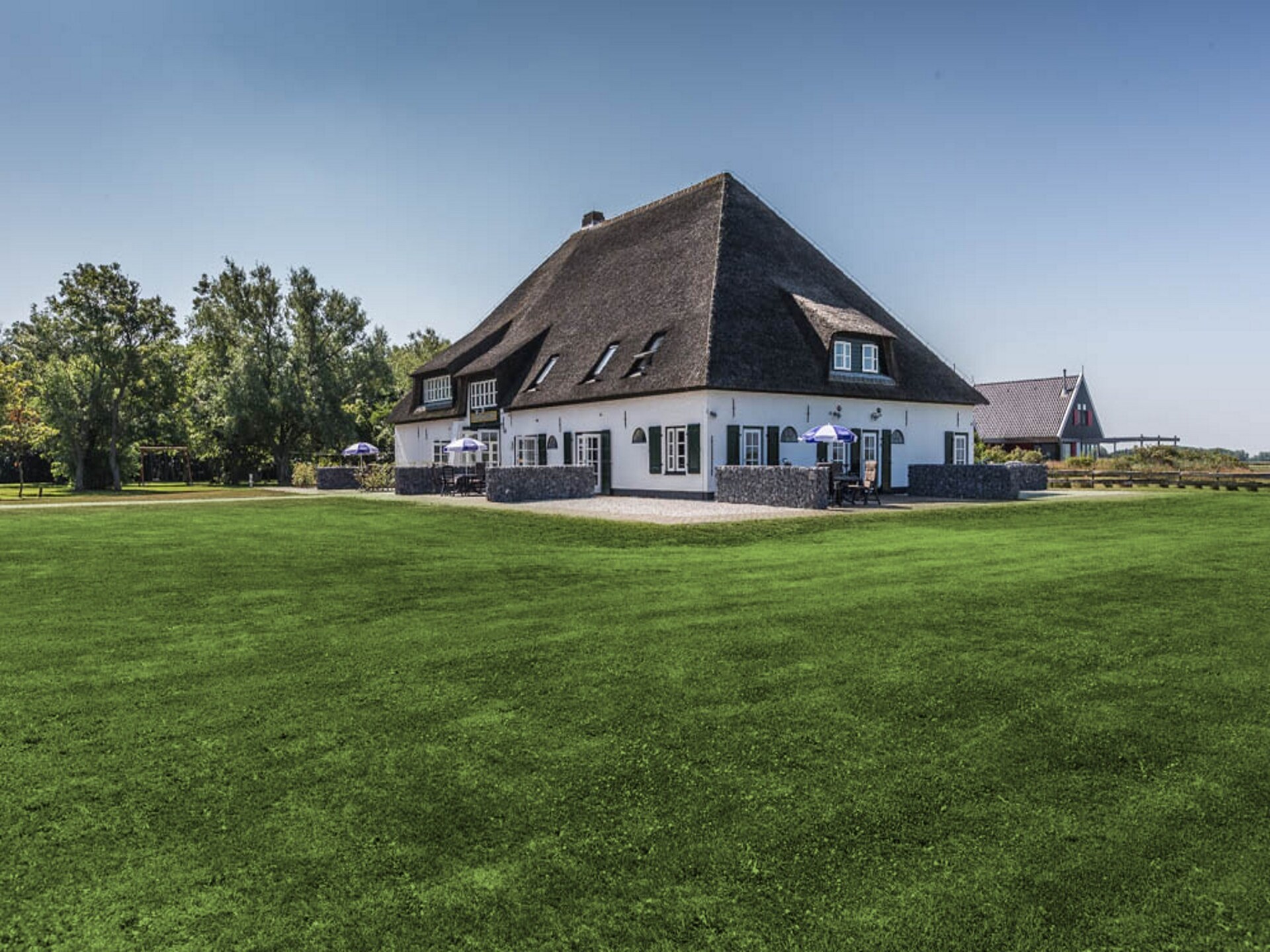 Knus hoekappartement in historische stolpboerderij op Texel, nabij bos en golfbaan - foto 30
