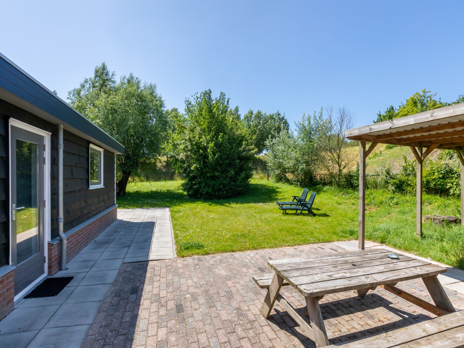 Vrijstaand vakantiehuis aan Veerse Meer met tuin en golfbaan - foto 16