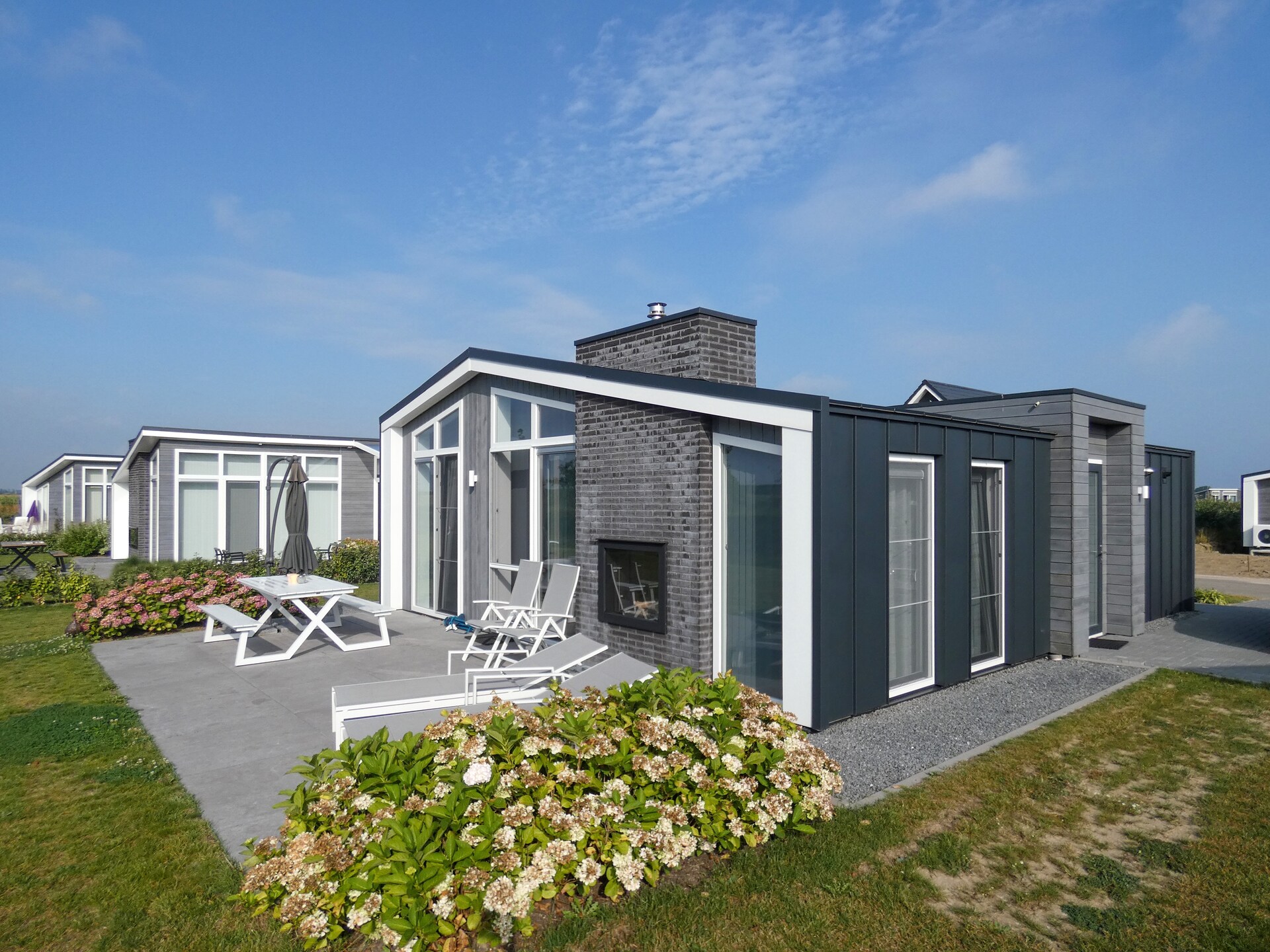 Stijlvol chalet aan de Oosterschelde met privéterras en sfeerhaarden - foto 6