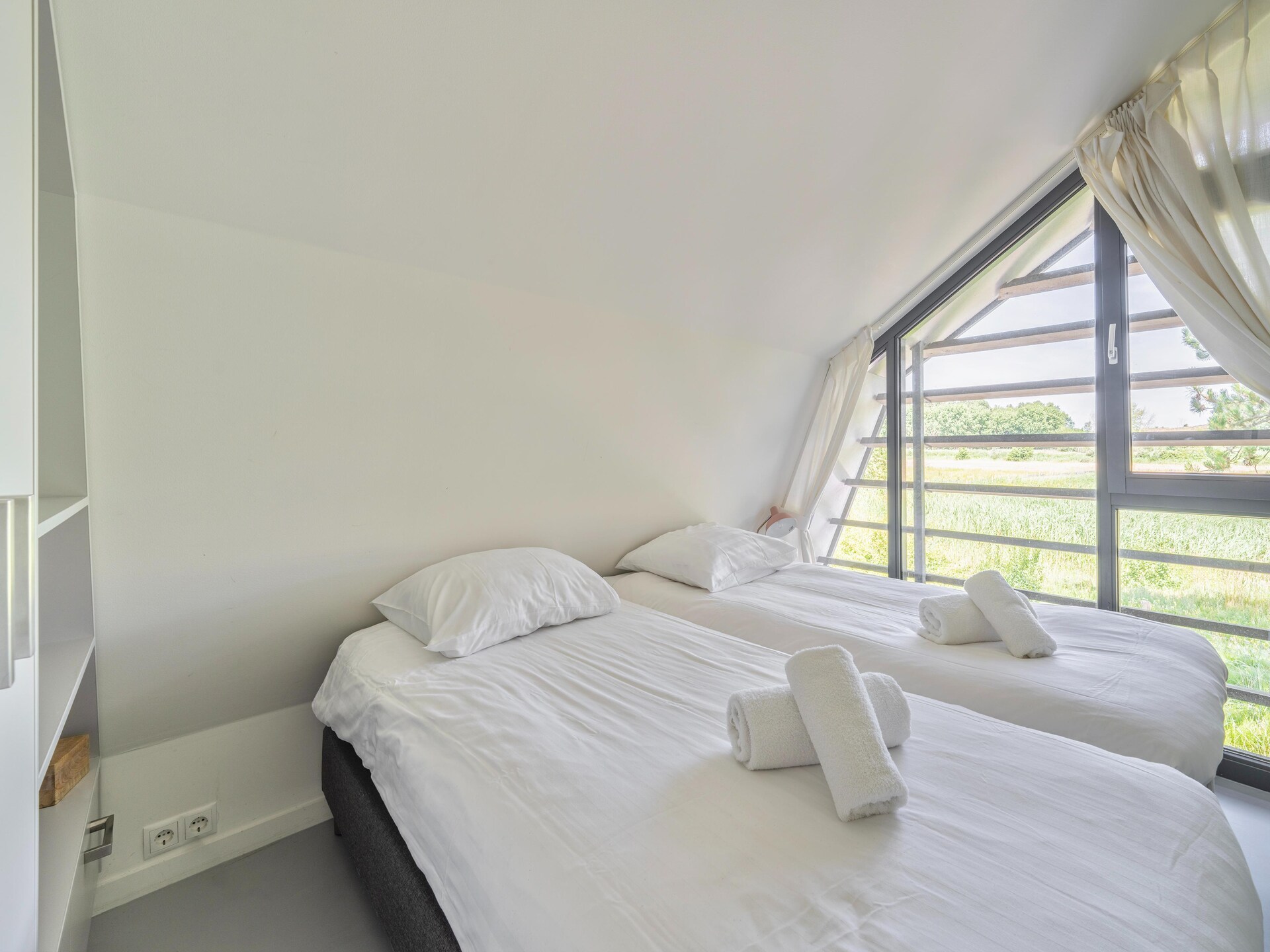 Duinvilla aan het Meer: stijlvol vakantiehuis met uitzicht op molen en duinmeer - foto 4