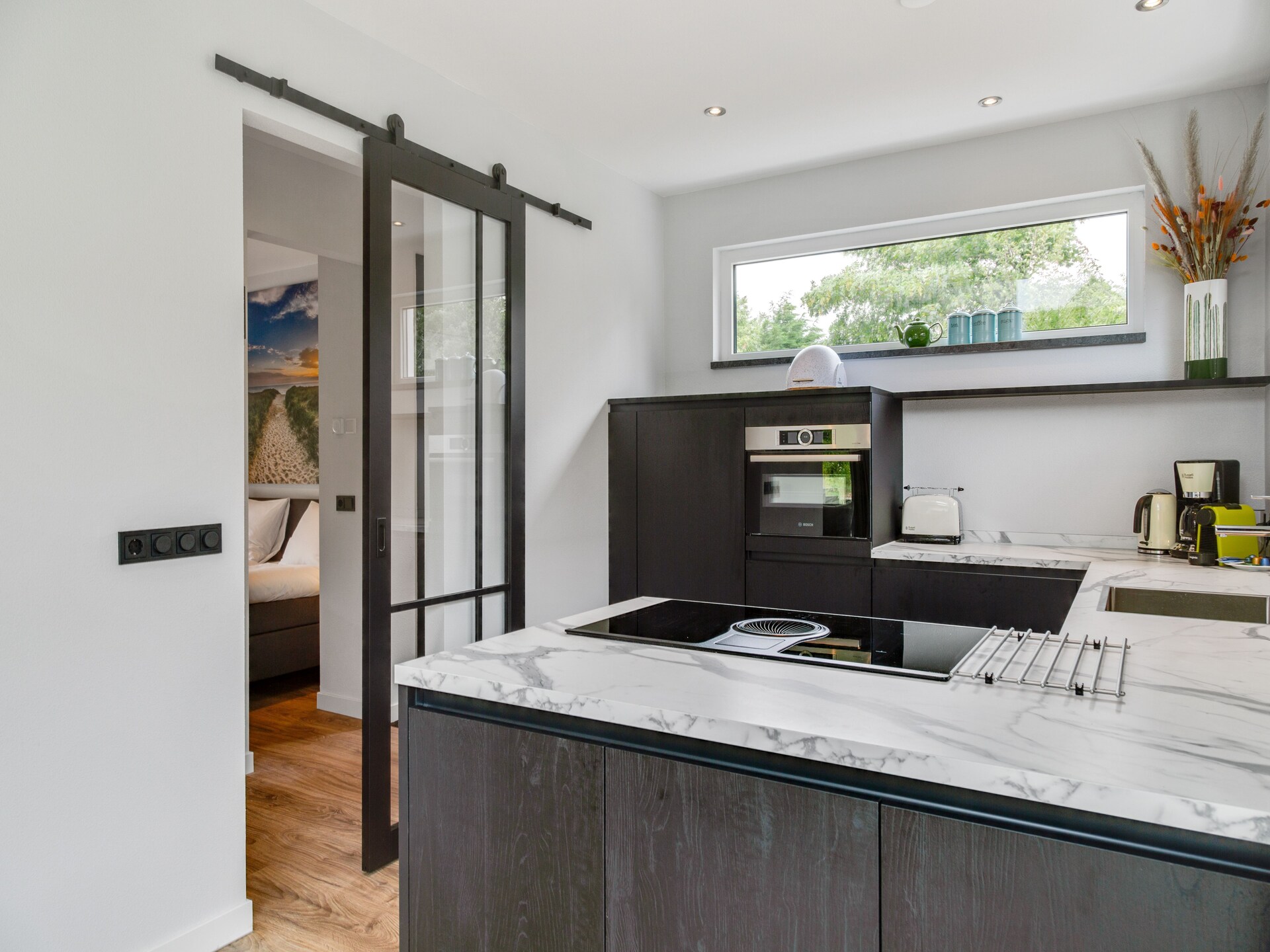 Luxe vakantiehuis met sauna in bosrijke omgeving bij De Koog - foto 11