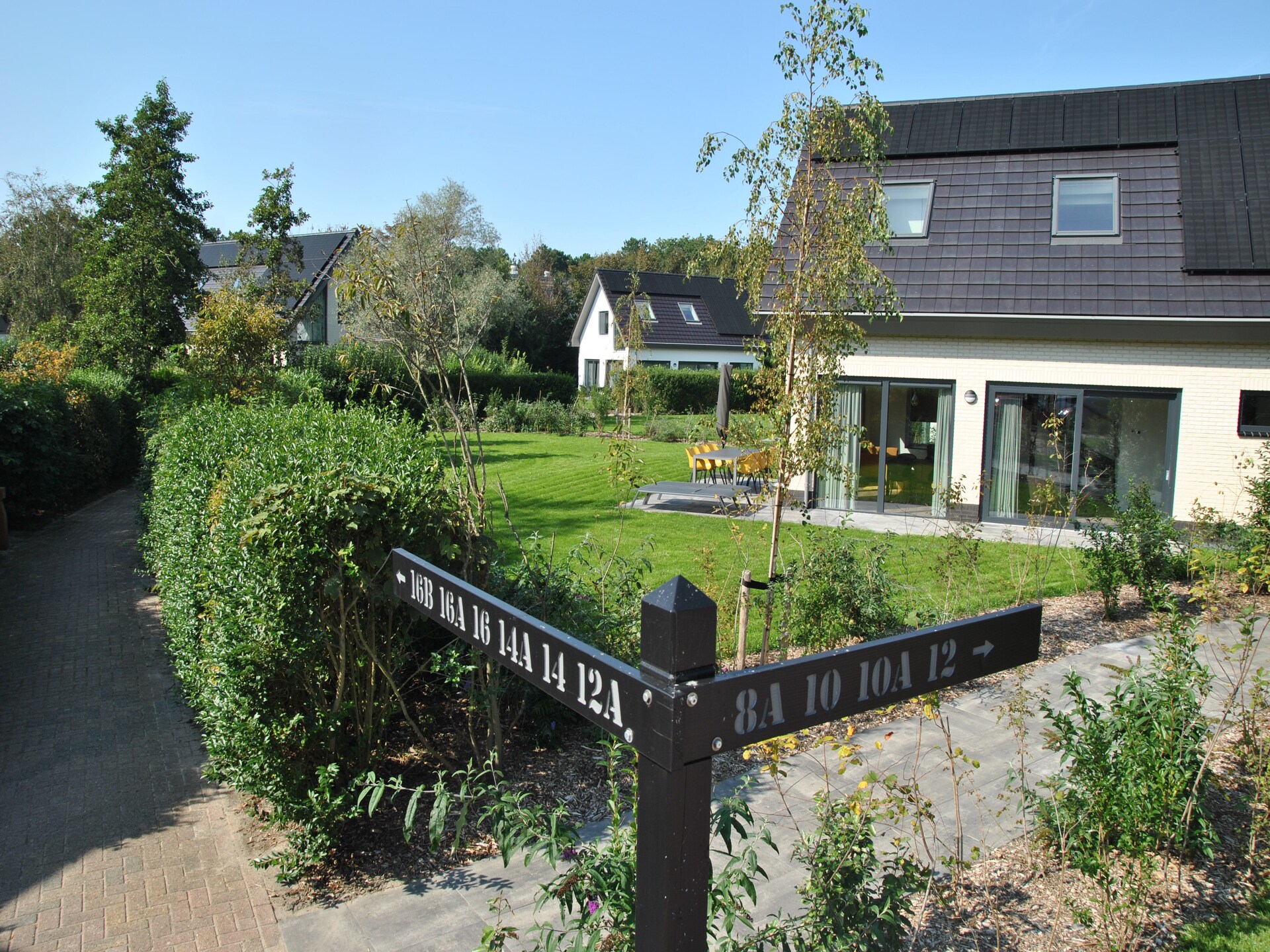 Luxe vakantiehuis met sauna in bosrijke omgeving bij De Koog - foto 33