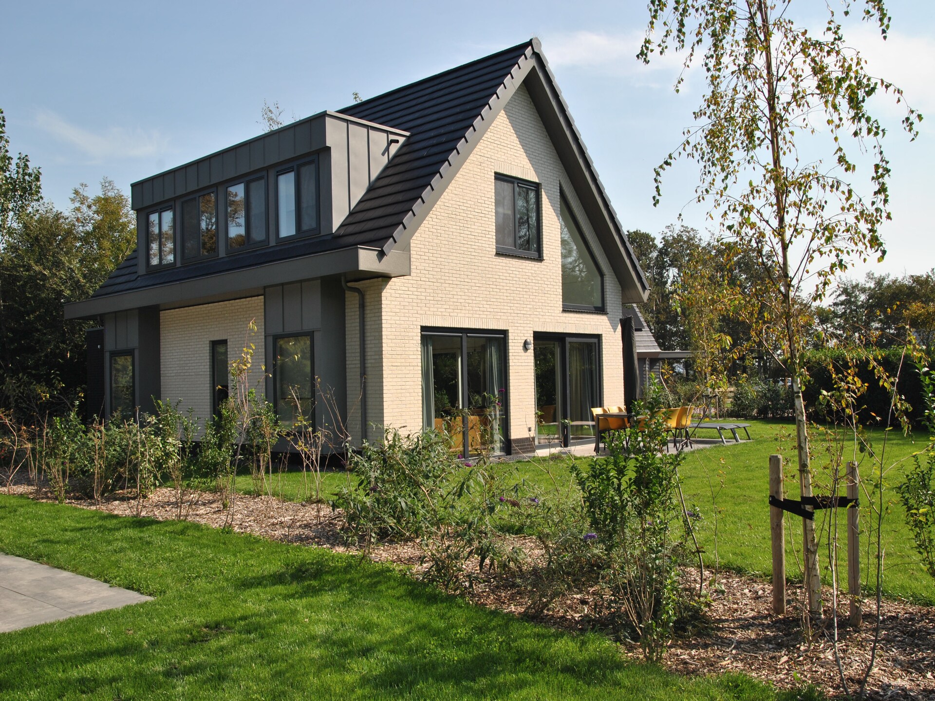 Luxe vakantiehuis met sauna in bosrijke omgeving bij De Koog - foto 32
