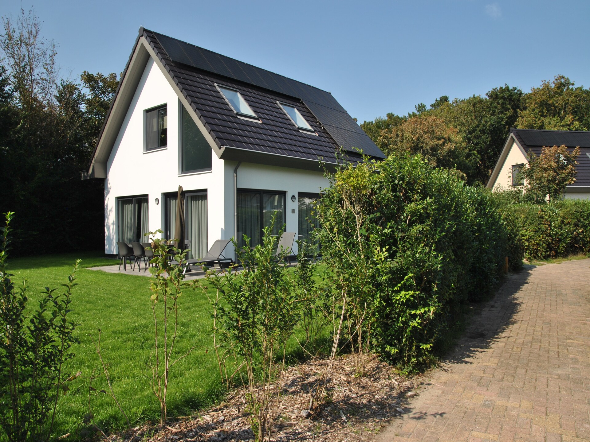 Luxe vakantiewoning met sauna en sunshower in bosrijk De Koog - foto 12