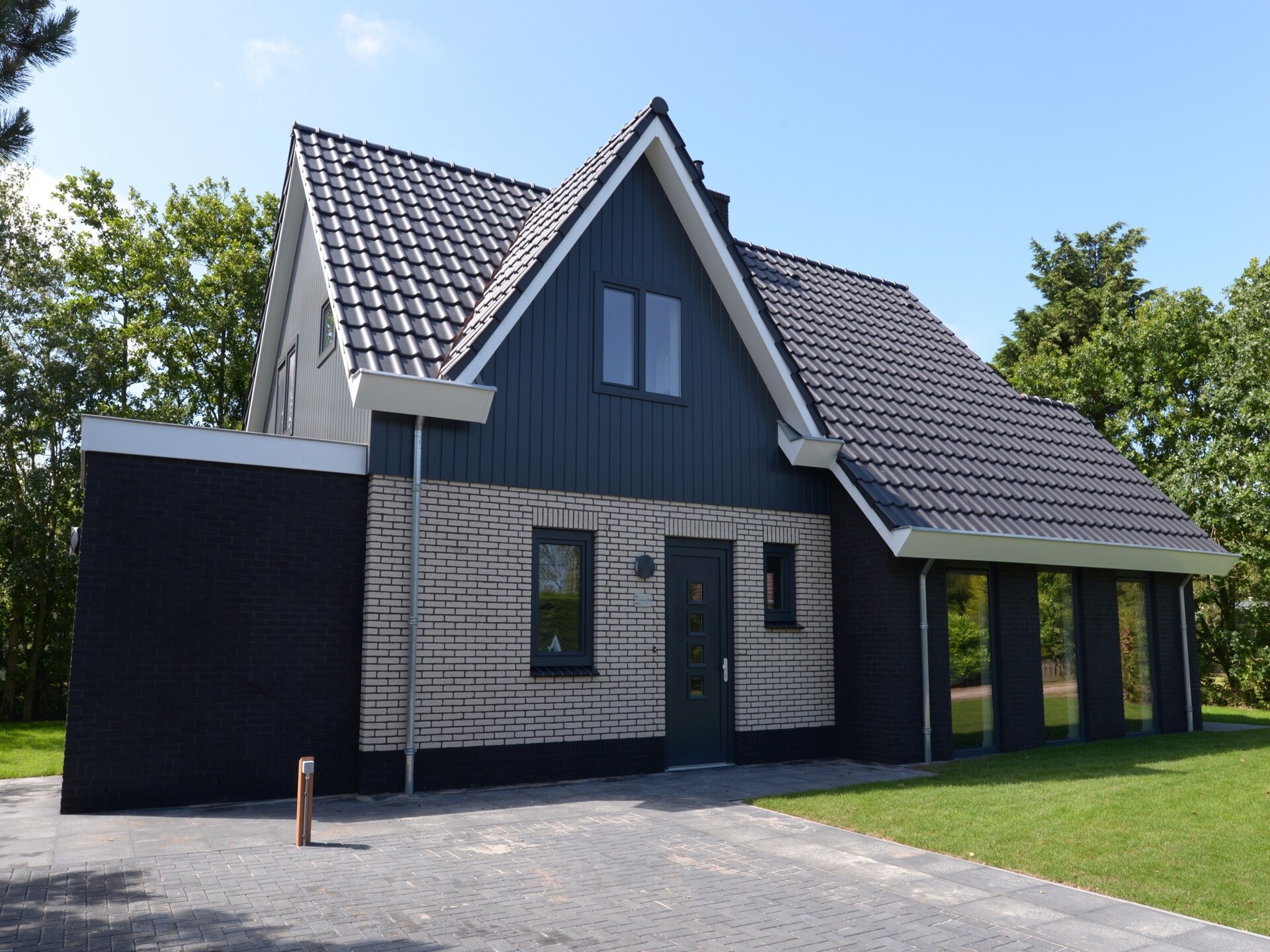 Luxe vakantiewoning met sauna en sunshower in bosrijk De Koog - foto 11