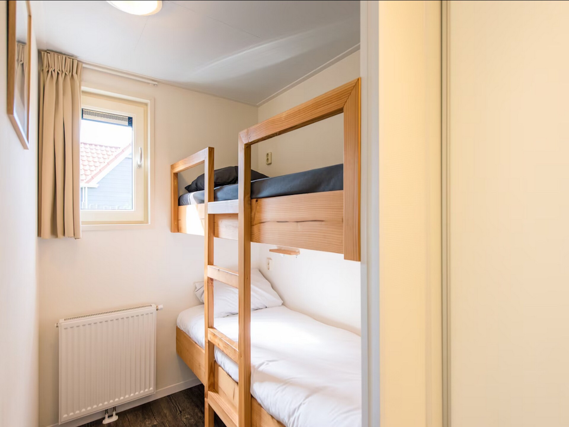 Moderne gezinsbungalow bij zee op Ameland – Vakantiepark Boomhiemke - foto 8