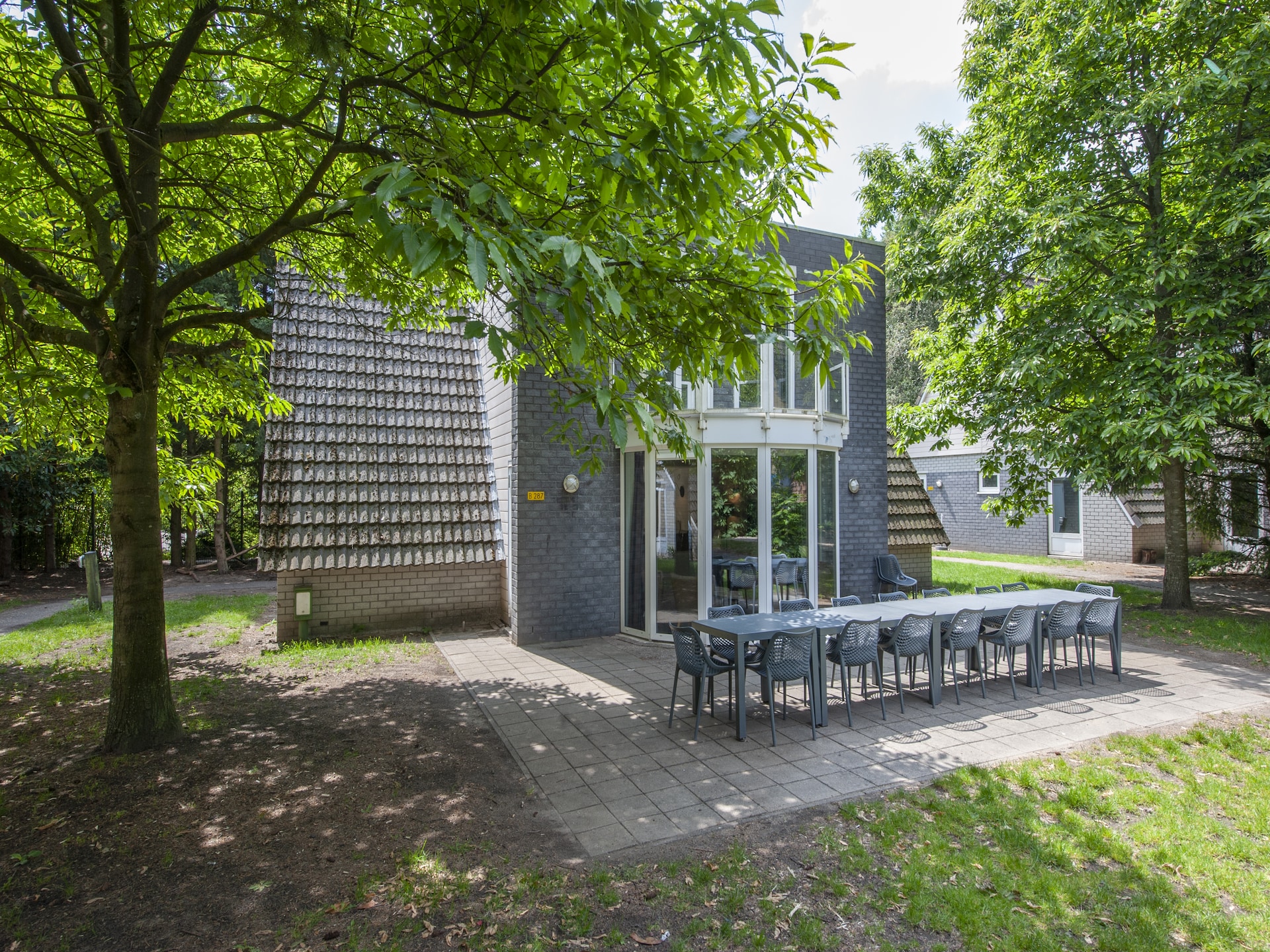 Vrijstaande groepsvilla voor 18 personen op bosrijk vakantiepark bij Breda - foto 3