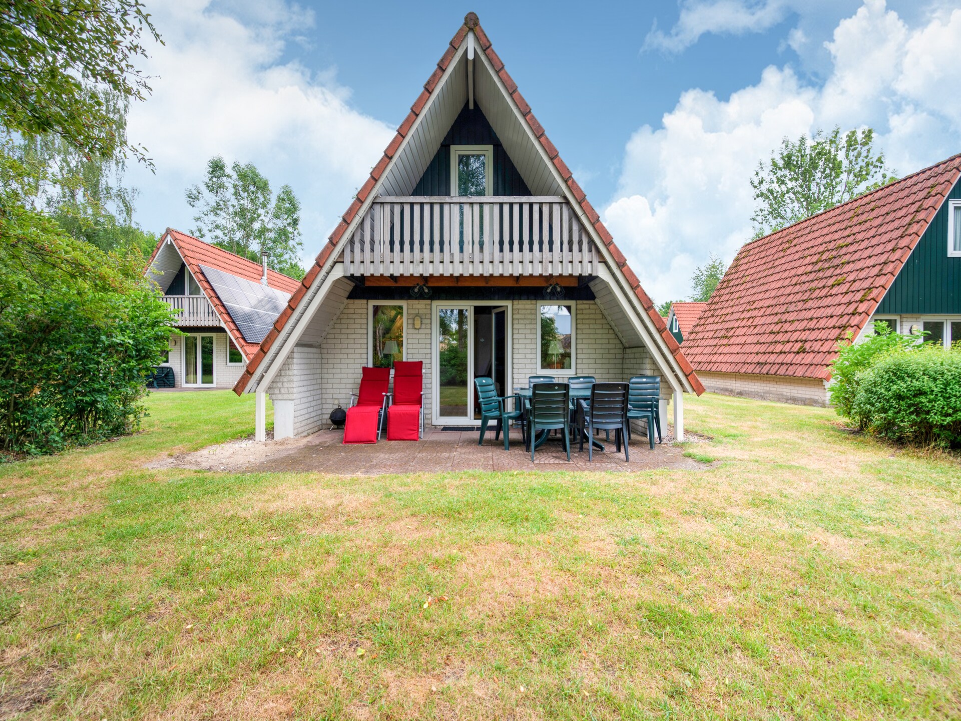Vrijstaand boshuis met open haard op familievakantiepark Gramsbergen - foto 1