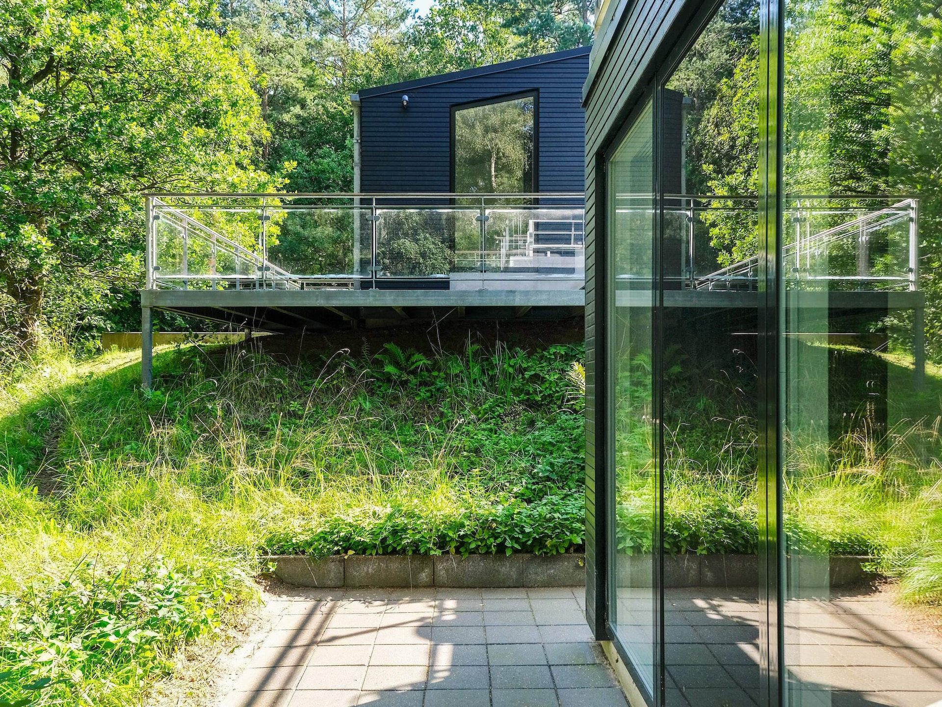 Architectonisch vakantiehuis met whirlpool en annex in bosrijke omgeving - foto 35