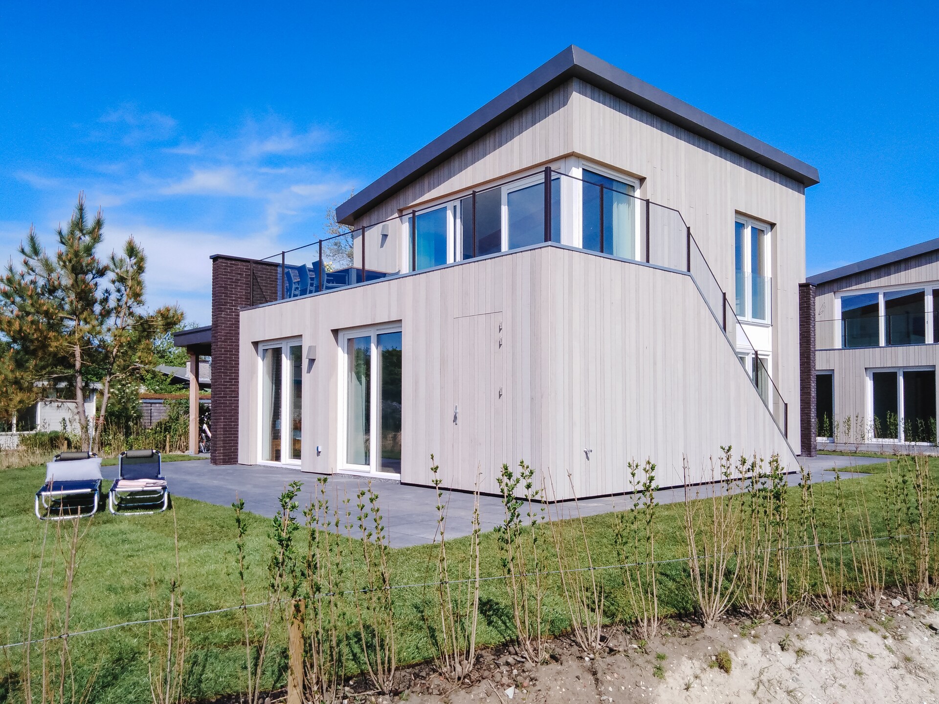 Luxe villa aan het Veerse Meer met panoramisch dakterras en golfomgeving - foto 5
