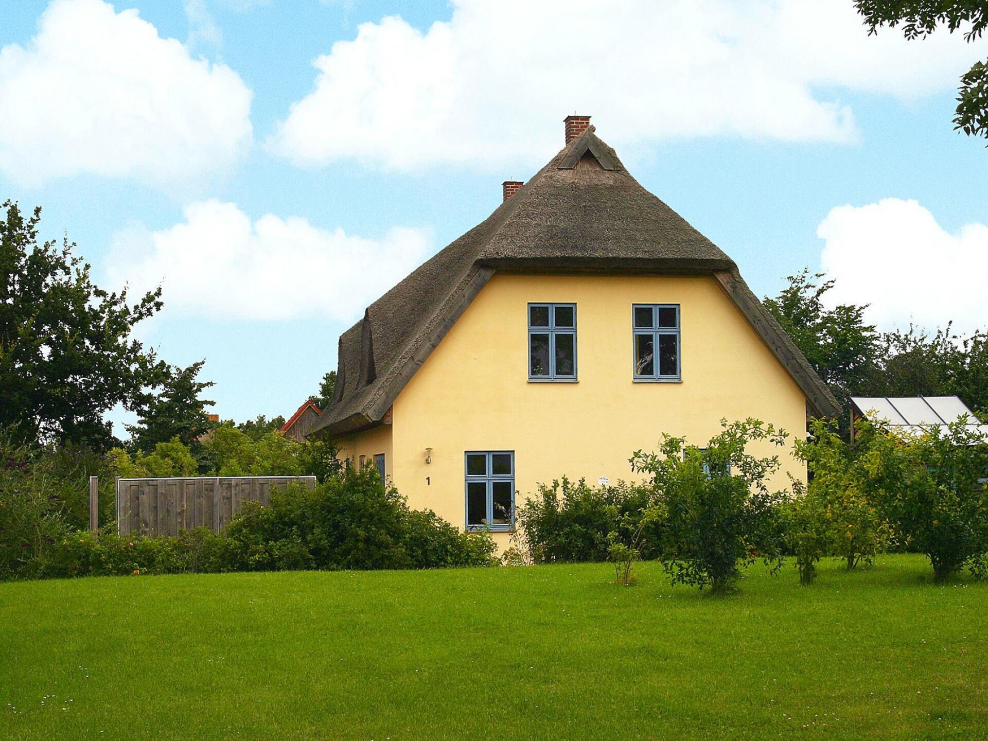 Rietgedekt vakantiehuis met sauna en open haard in Vieregge, Rügen - foto 3