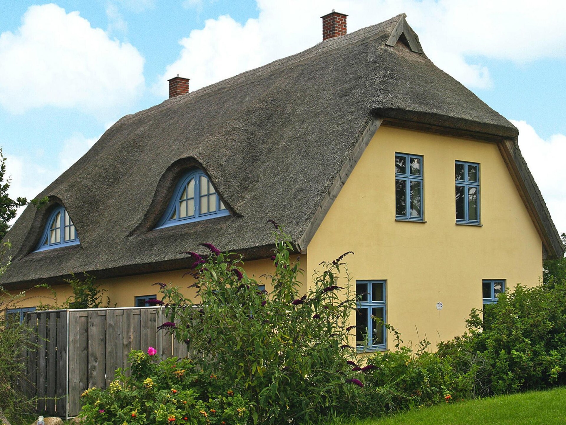 Rietgedekt vakantiehuis met sauna en open haard in Vieregge, Rügen - foto 1