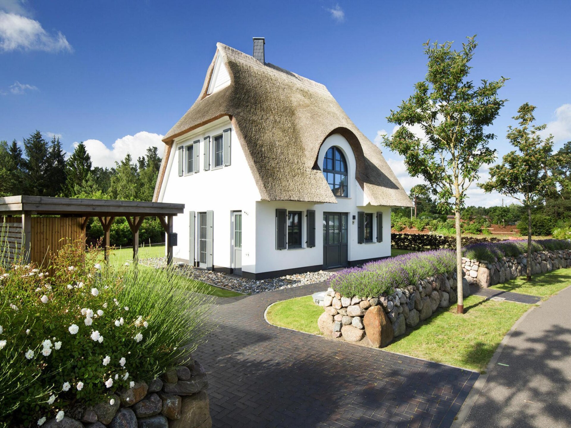 Luxe rietgedekt vakantiehuis met sauna aan de lagune bij Fuhlendorf - foto 1