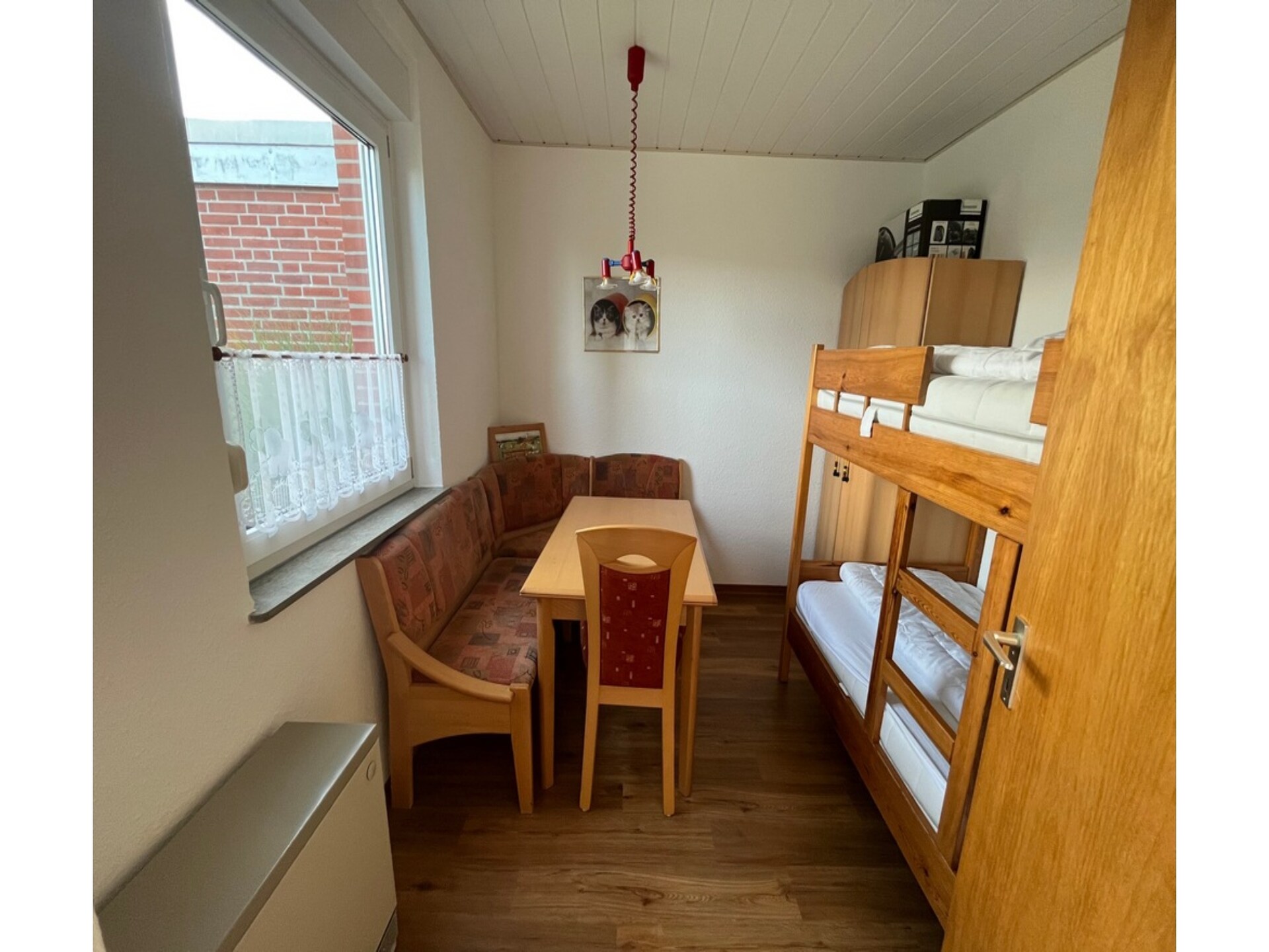 Knusse bungalow bij zee met fietsen, tuin en tennisbaan in Dornumersiel - foto 7