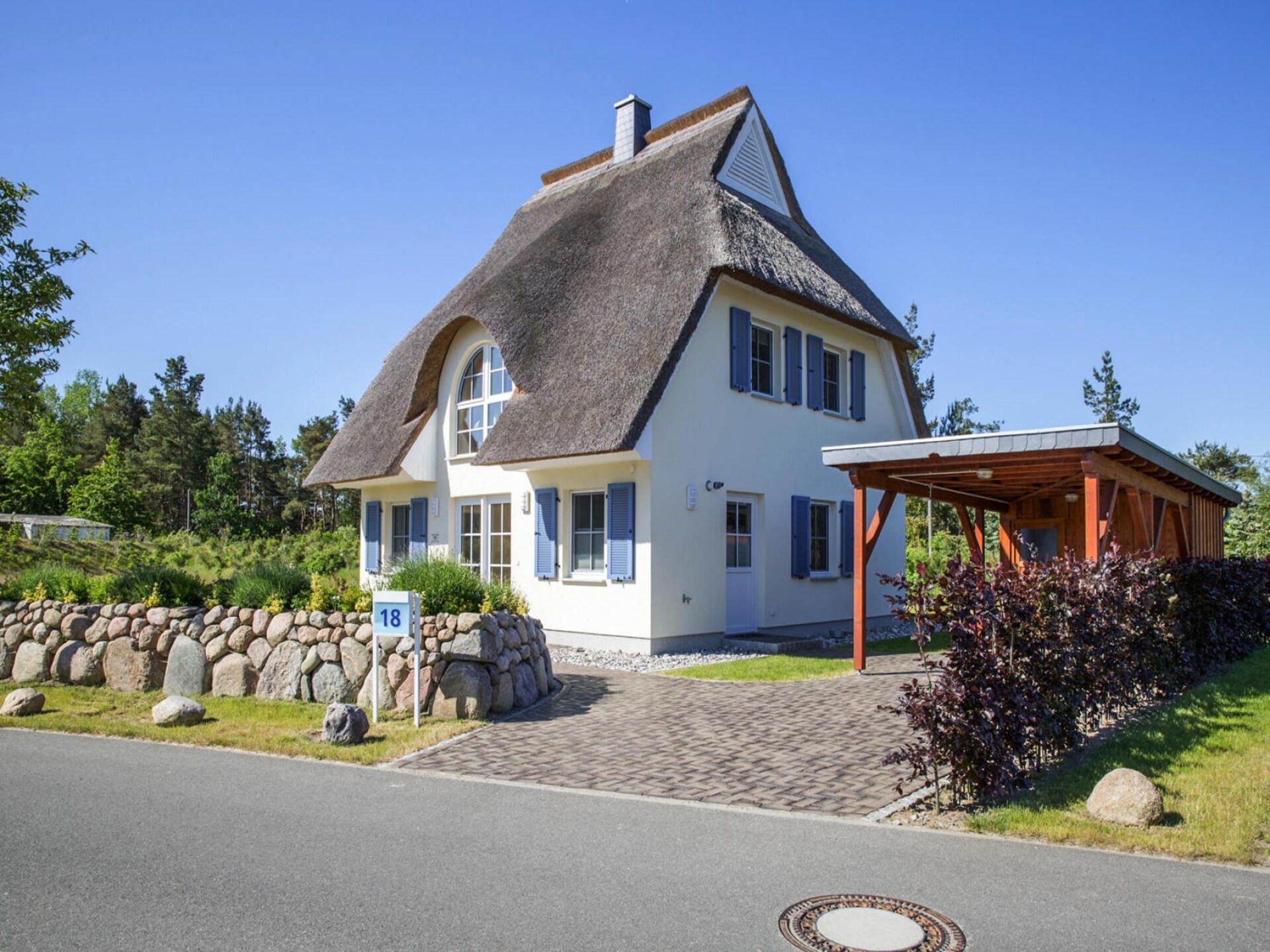 Luxe rietgedekt vakantiehuis met zwemplek aan de lagune in Fuhlendorf - foto 22