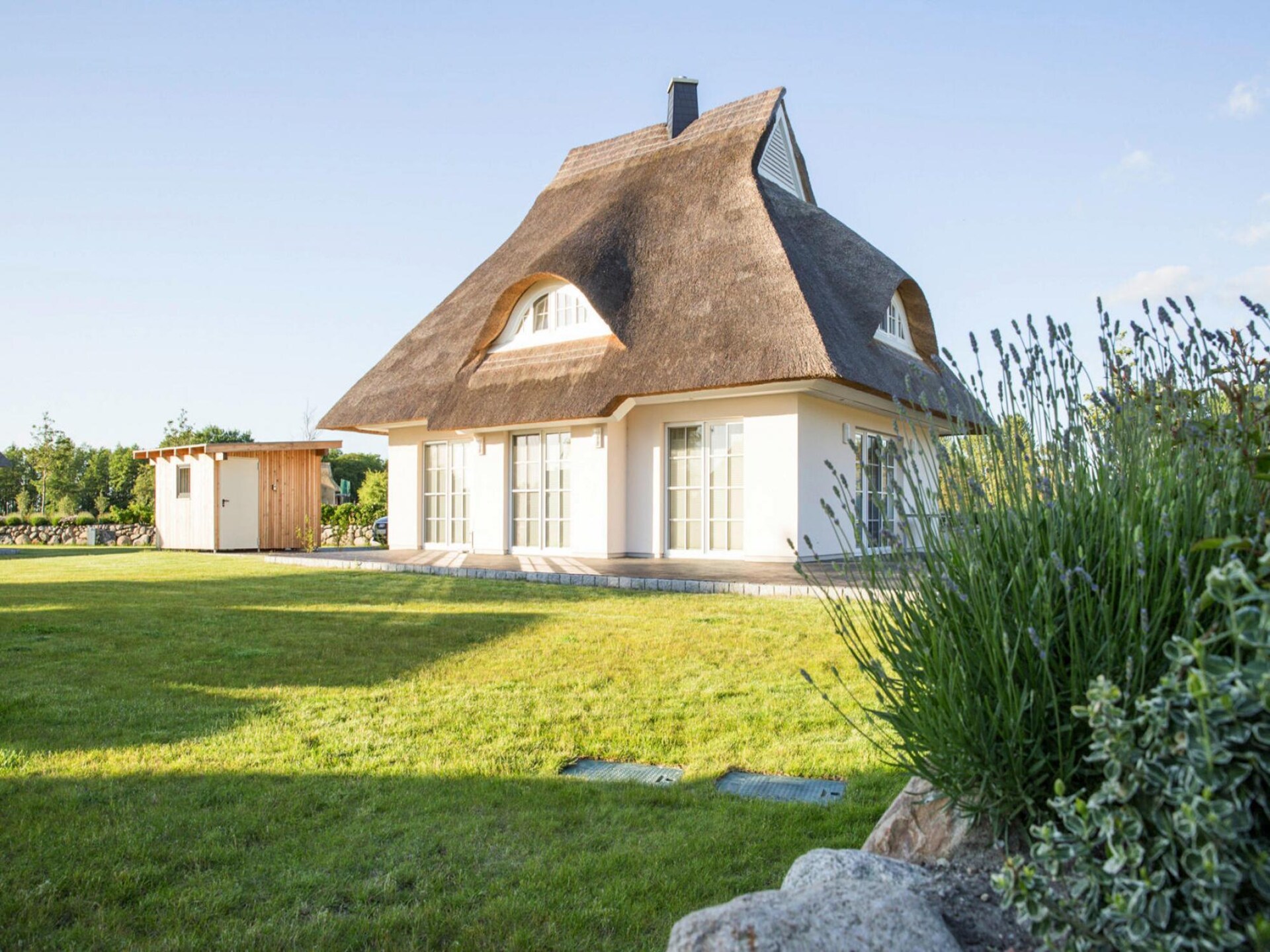 Rietgedekt vakantiehuis aan de lagune met sauna, 100 meter van het water - foto 22