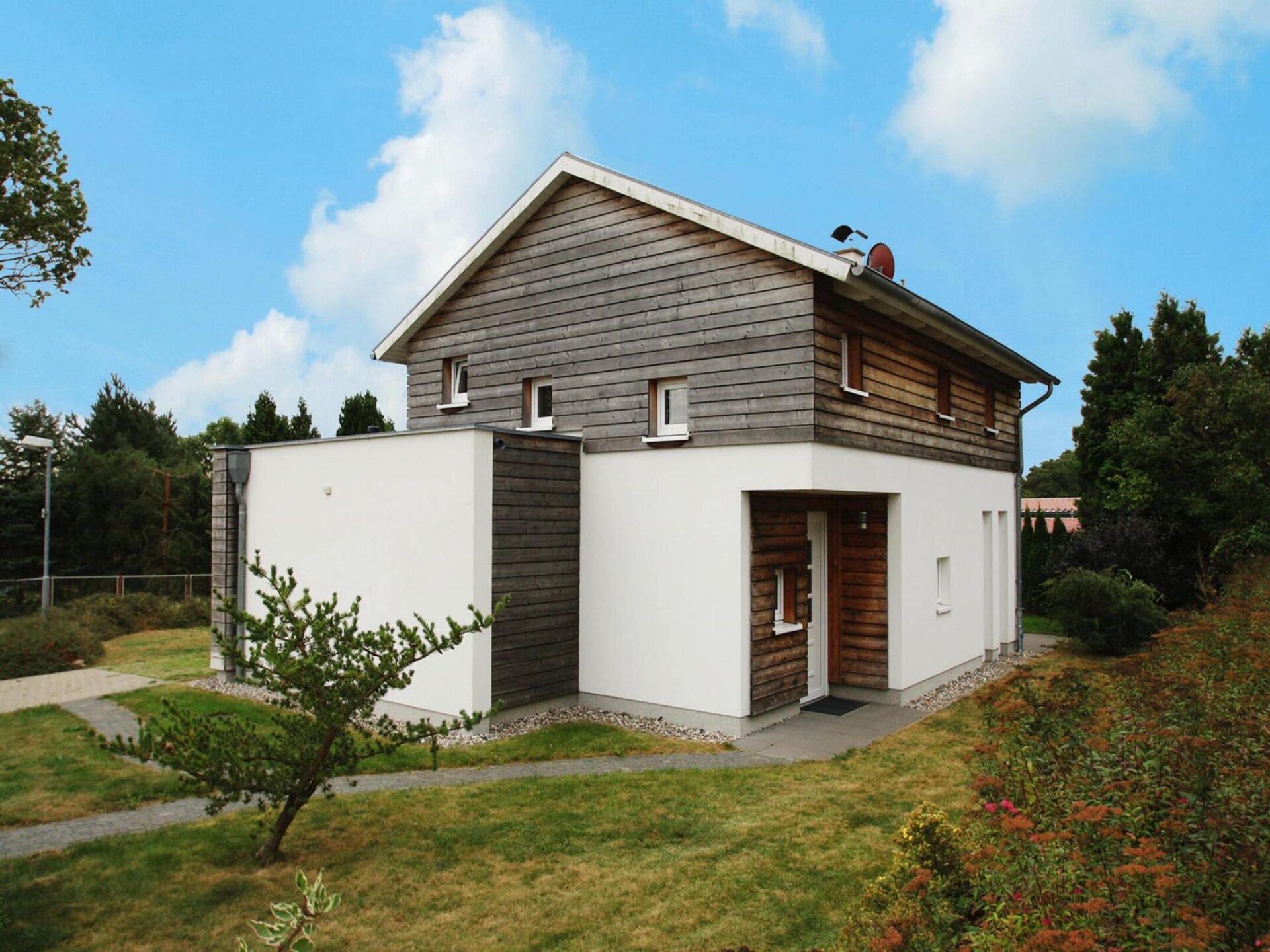 Ferienhaus An de Linn: Luxe vakantiehuis met sauna aan het meer van Neukloster - foto 2