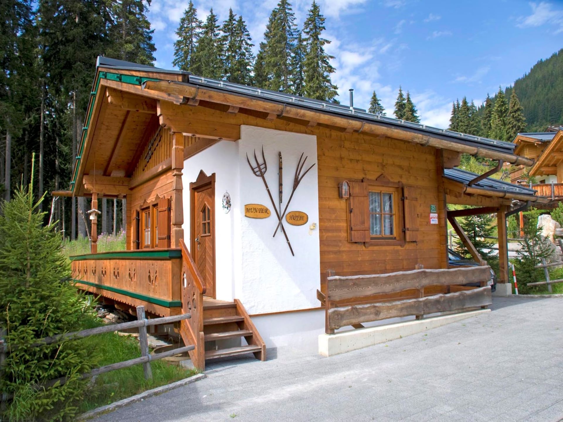 Vrijstaand chalet Munterhütte aan de bosrand bij Königsleiten - foto 1