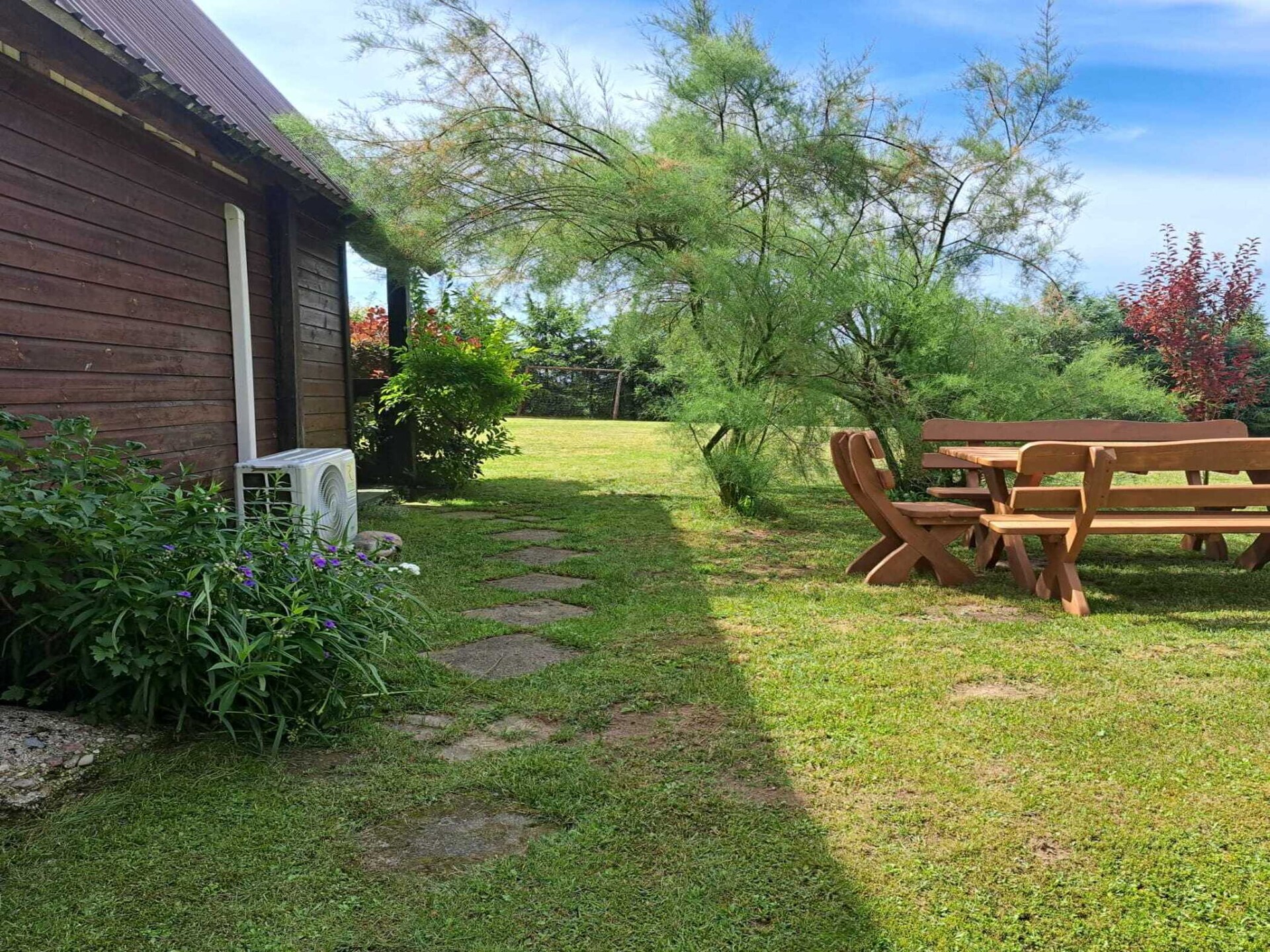 Knus houten vakantiehuis met open haard en tuin nabij meer in Dobrogoszcz - foto 16