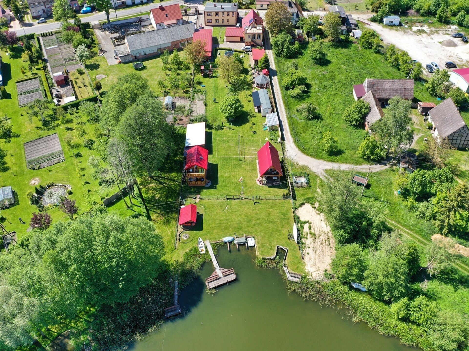 Knusse stacaravan aan het meer van Ostrowiec met privéstrand en watersport - foto 28