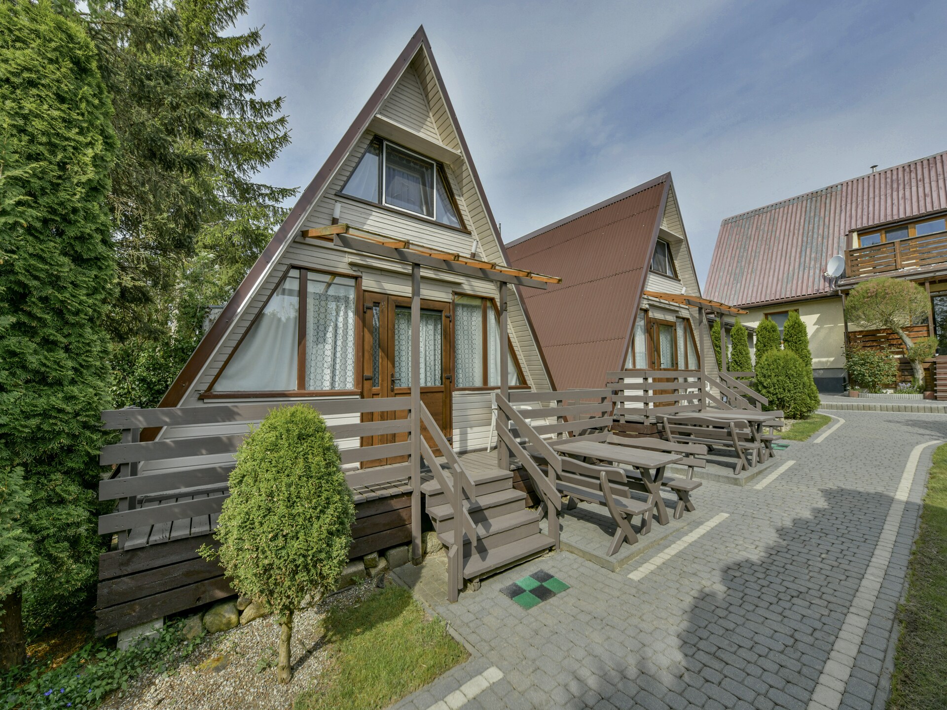 Houten vakantiehuis voor 5 in bosrijk resort bij strand Kołobrzeg - foto 1