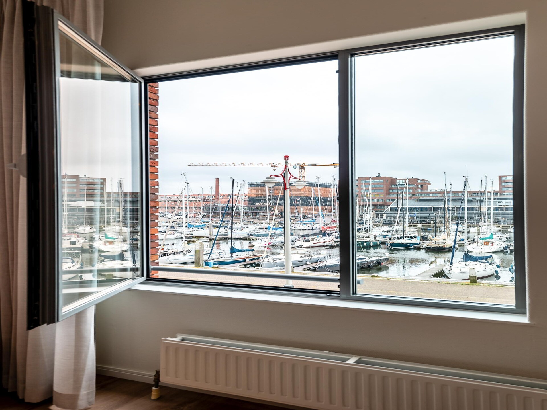 Luxe appartement met havenzicht in Scheveningen, 900m van het strand - foto 18
