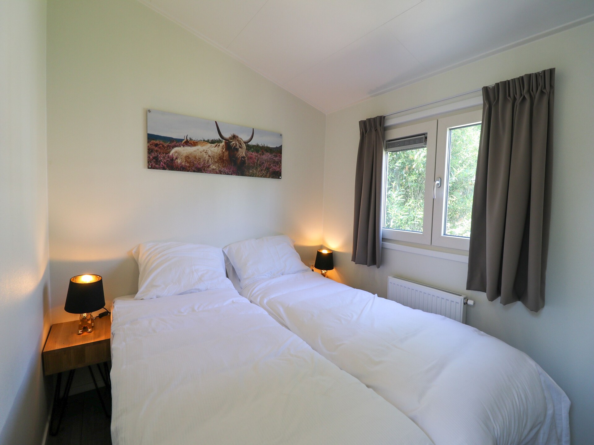 Gezinsvriendelijk chalet met uitzicht op speeltuin in Hoenderloo - foto 2