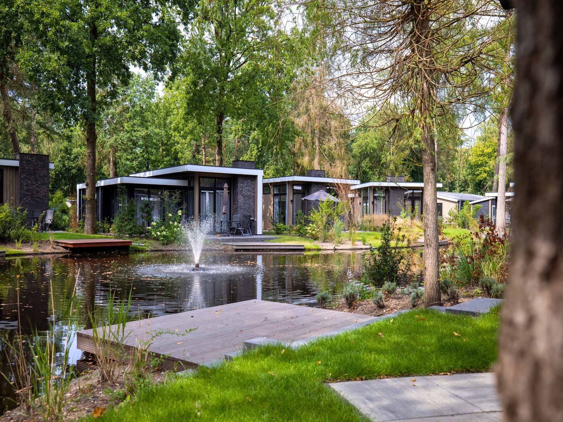 Gezinsvriendelijk chalet met uitzicht op speeltuin in Hoenderloo - foto 25