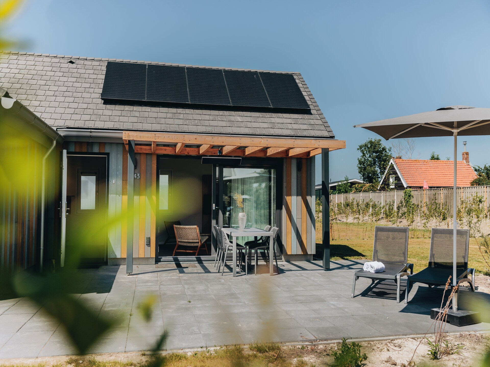 Luxe strandlodge met sauna op 500m van zee - foto 10