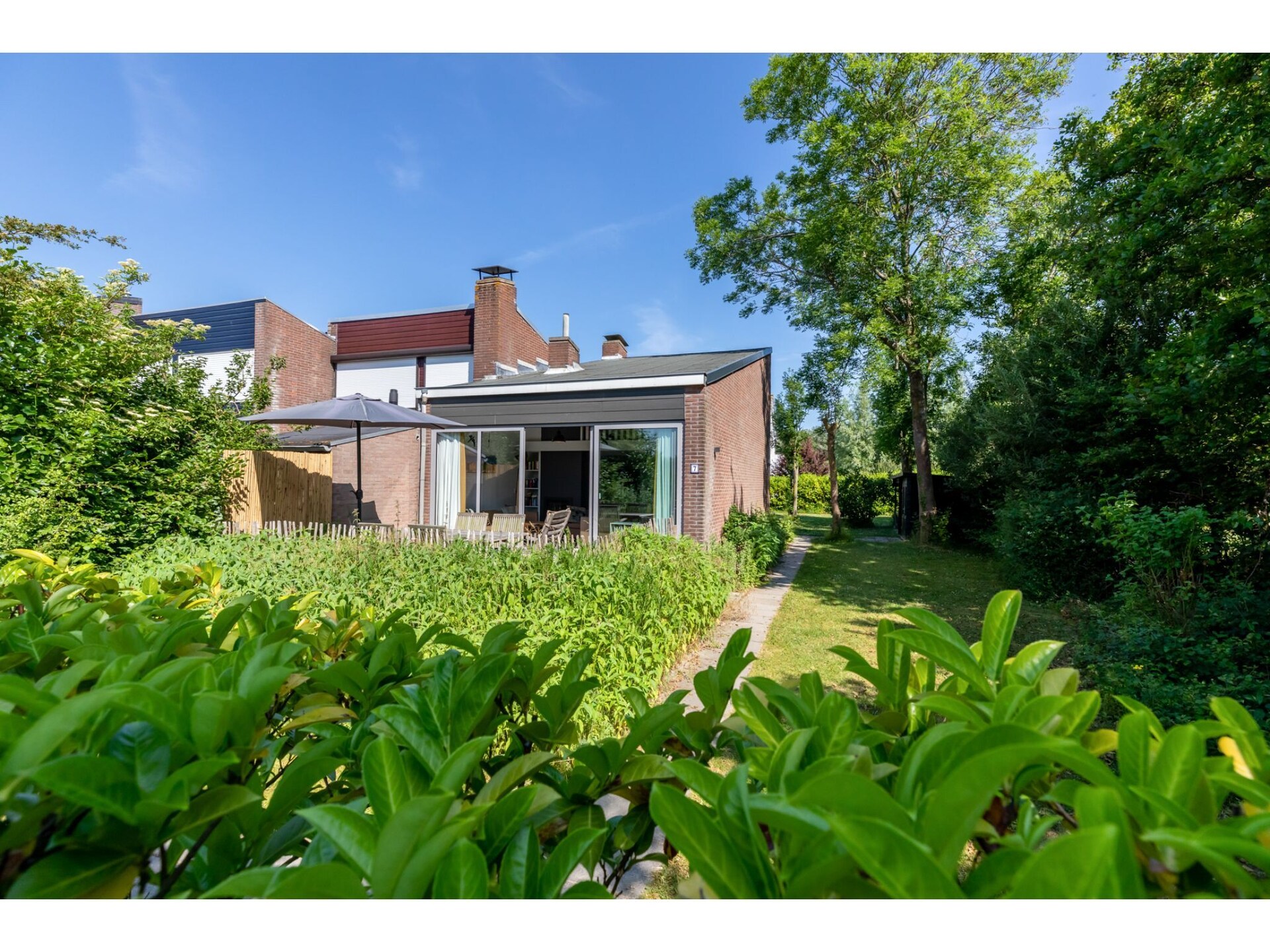 Vrijstaand vakantiehuis met grote tuin op 5 minuten van strand Nieuwvlietbad - foto 15