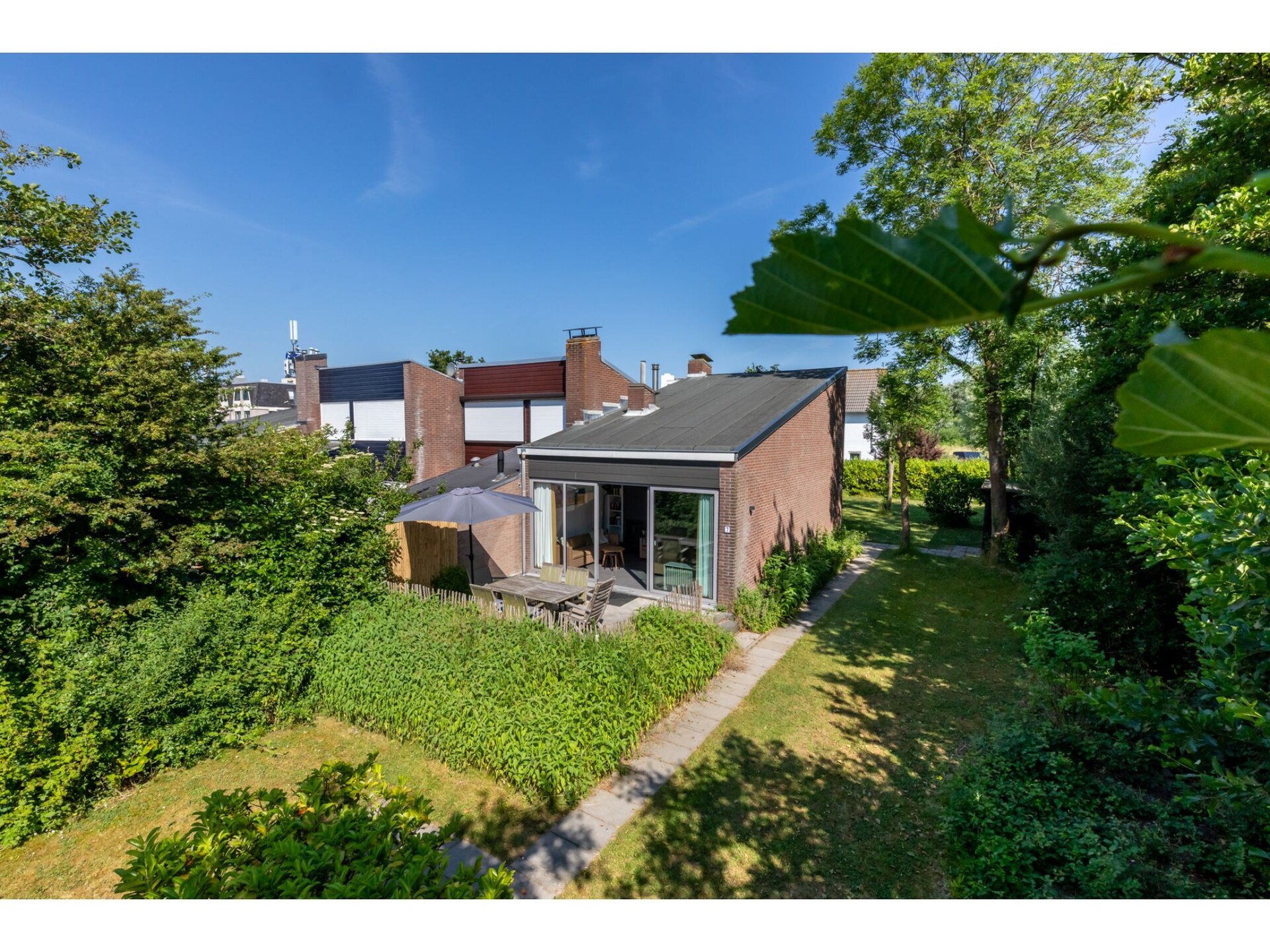 Vrijstaand vakantiehuis met grote tuin op 5 minuten van strand Nieuwvlietbad - foto 12