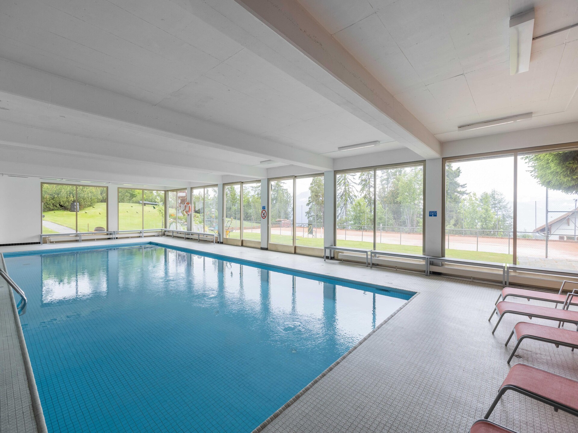 Cransalpin: luxe appartement met zwembad direct aan de piste in Crans-Montana - foto 10