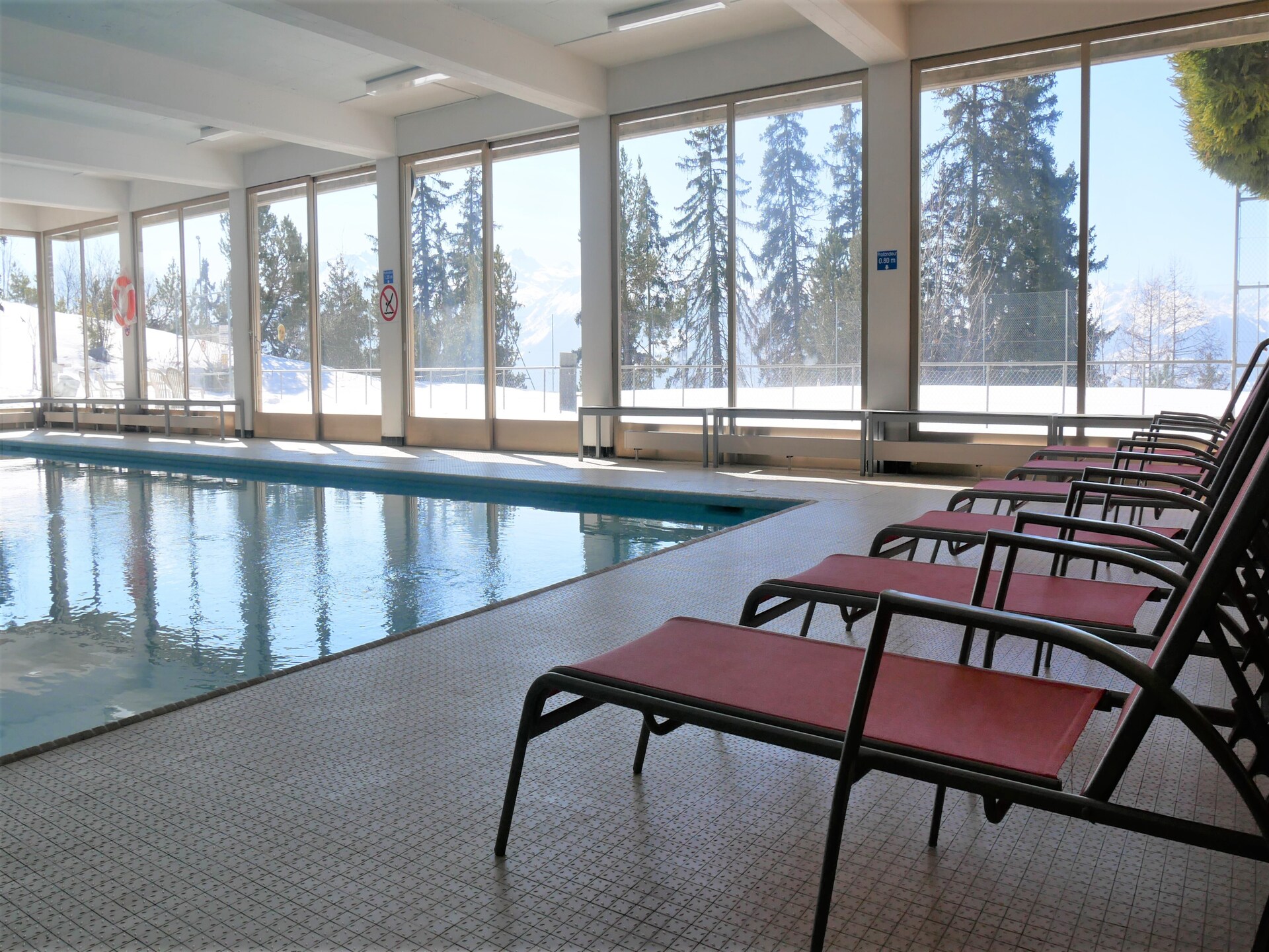 Cransalpin: luxe appartement met zwembad direct aan de piste in Crans-Montana - foto 43