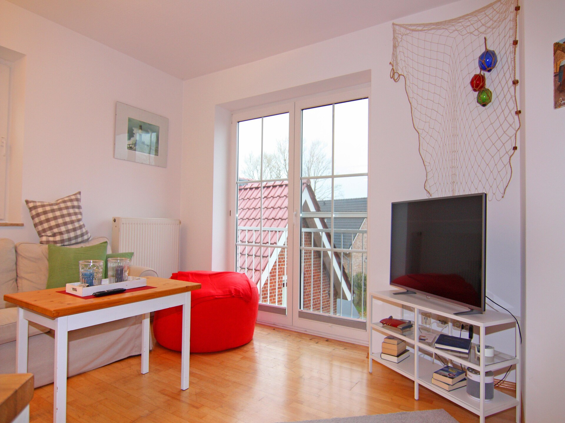 Licht appartement met Frans balkon in Orth, 5 km van strand - foto 3
