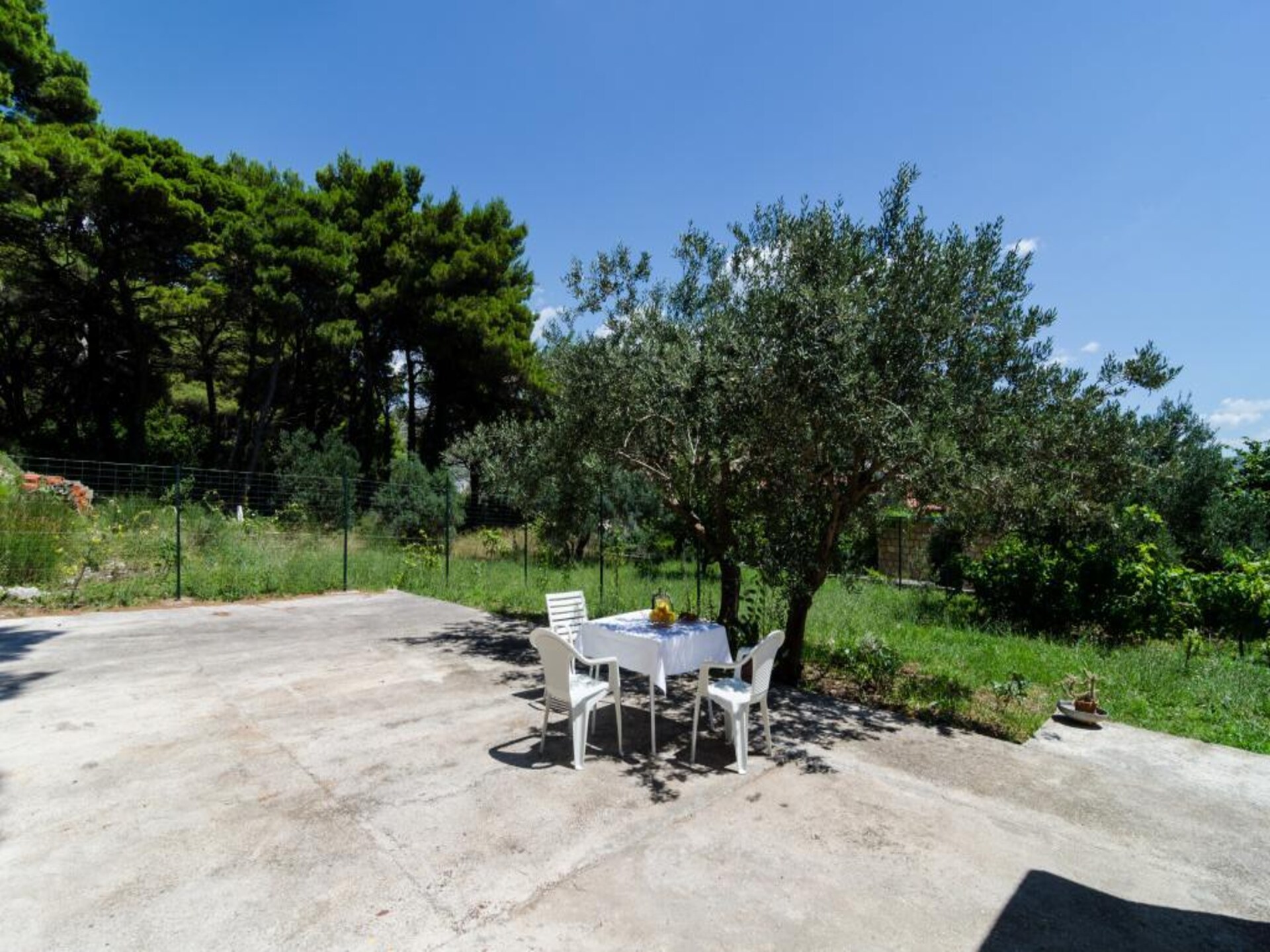Rustiek appartement met terras en tuinzicht op loopafstand van strand - foto 23