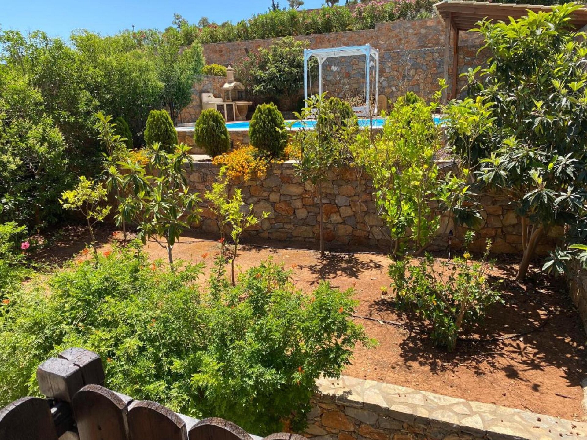 Vrijstaande villa met privézwembad en tuin op 1,4 km van het strand in Elounda - foto 19
