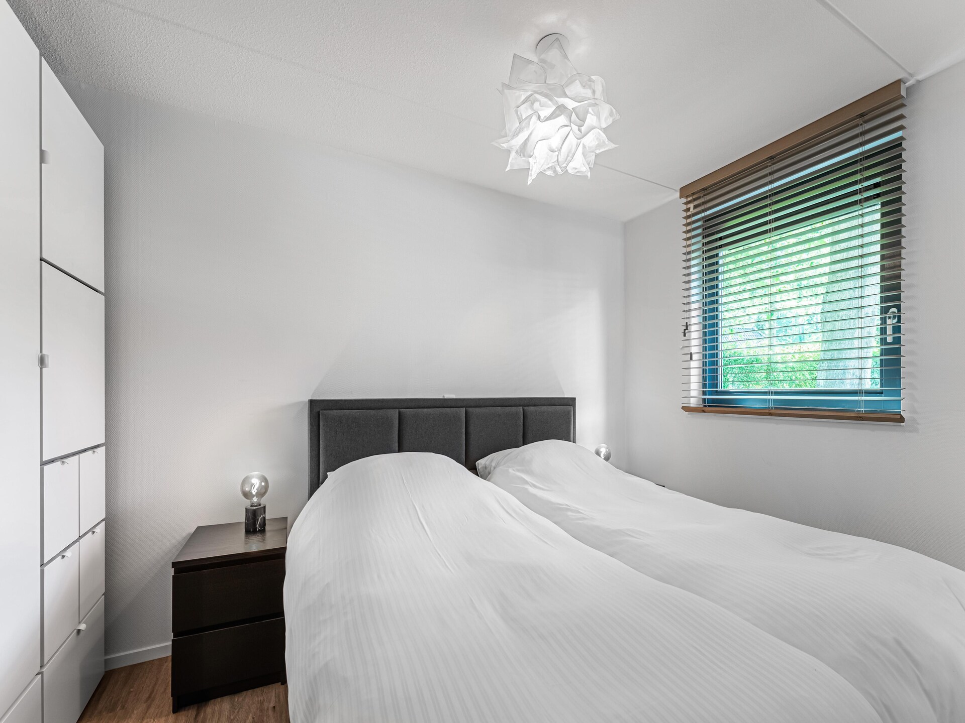 Boschhuis Boucle: vrijstaand vakantiehuis met uitzicht op water in Lochem - foto 15