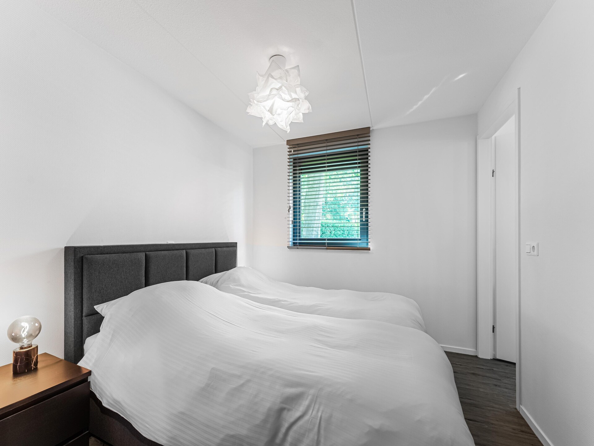 Boschhuis Boucle: vrijstaand vakantiehuis met uitzicht op water in Lochem - foto 16