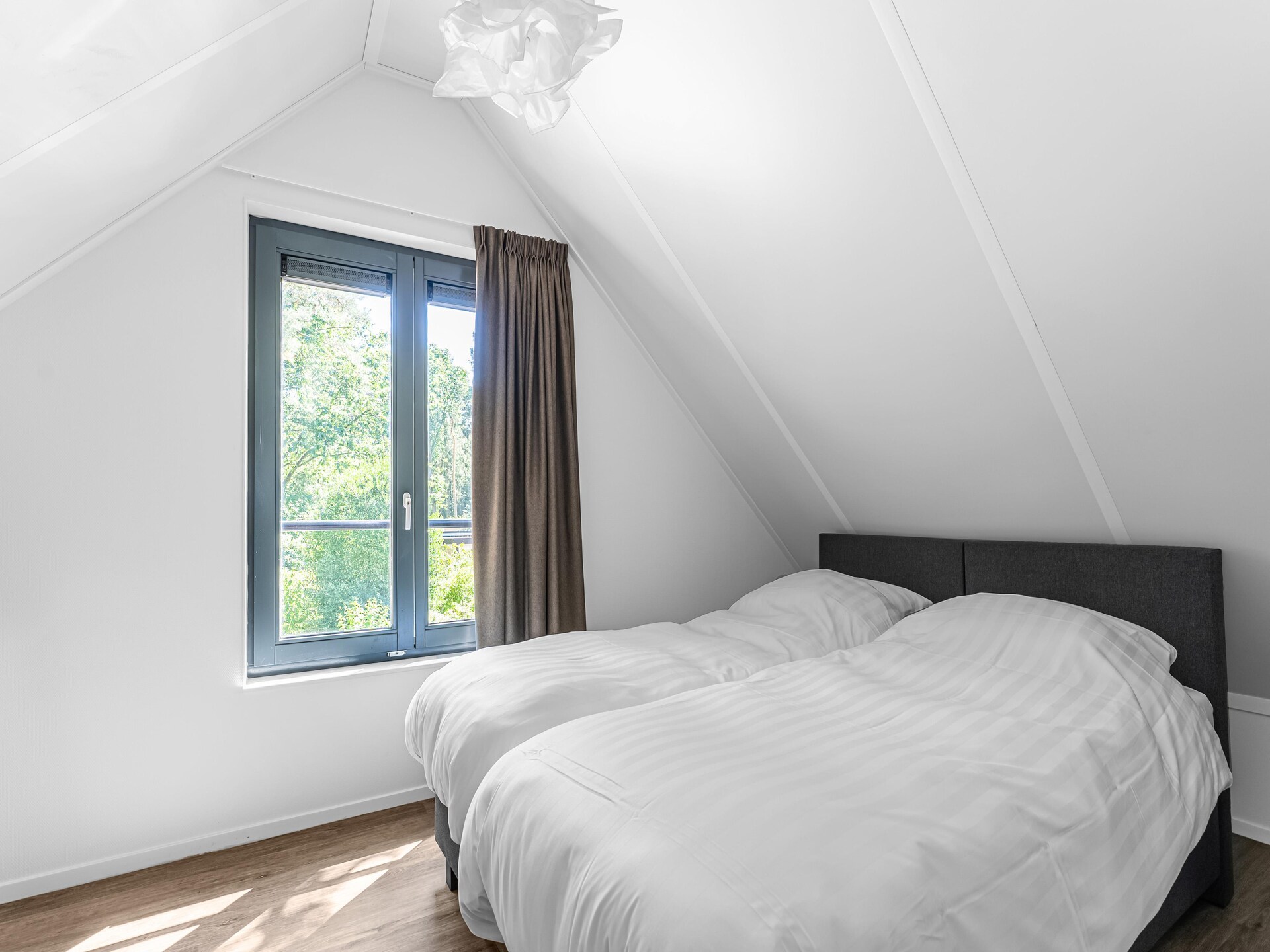 Boschhuis Boucle: vrijstaand vakantiehuis met uitzicht op water in Lochem - foto 17