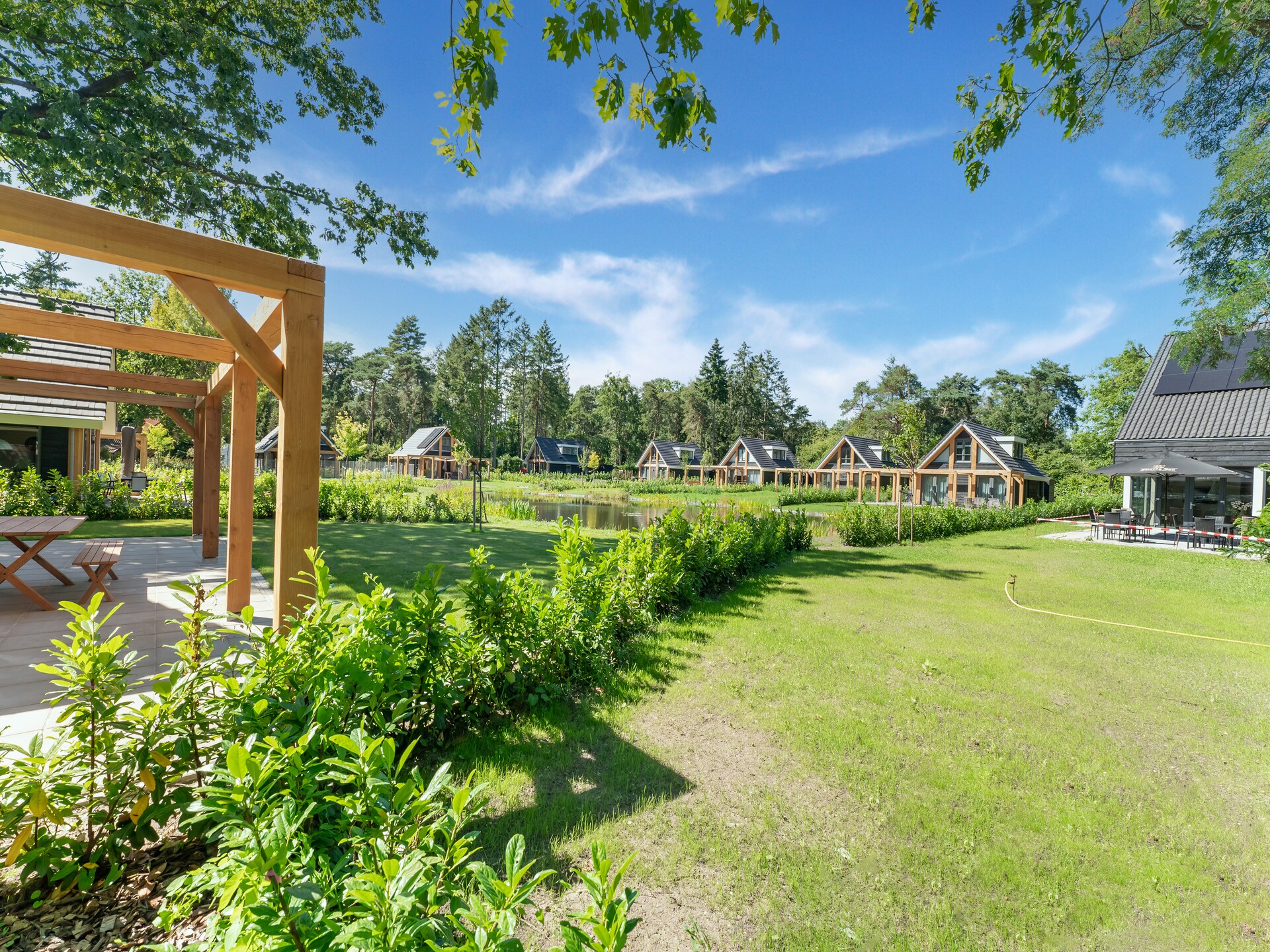 Boschhuis Boucle: vrijstaand vakantiehuis met uitzicht op water in Lochem - foto 26