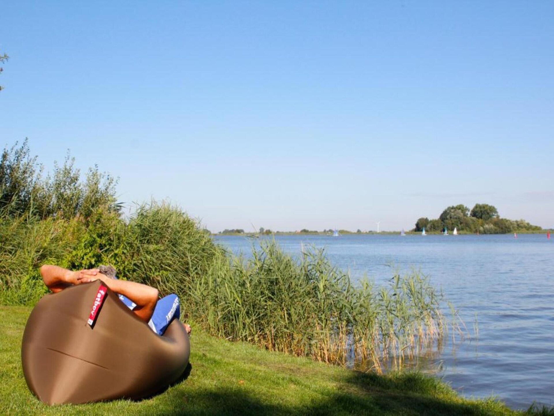 Rietgedekte villa aan het water voor 9 personen op Recreatiepark Idskenhuizen - foto 41