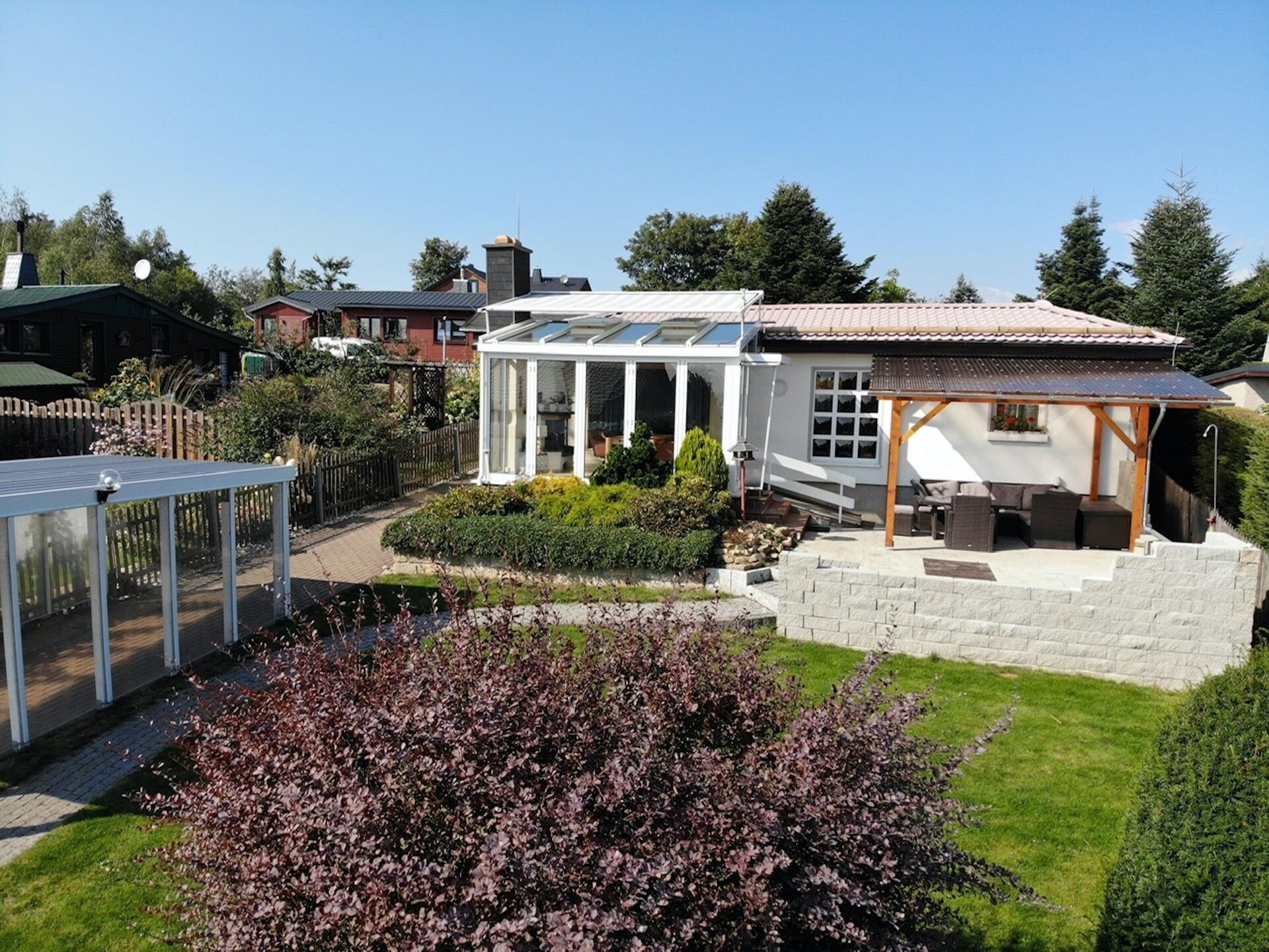 Bosrijke vrijstaande bungalow met serre, open haard en omheinde tuin in Friedrichsbrunn - foto 1