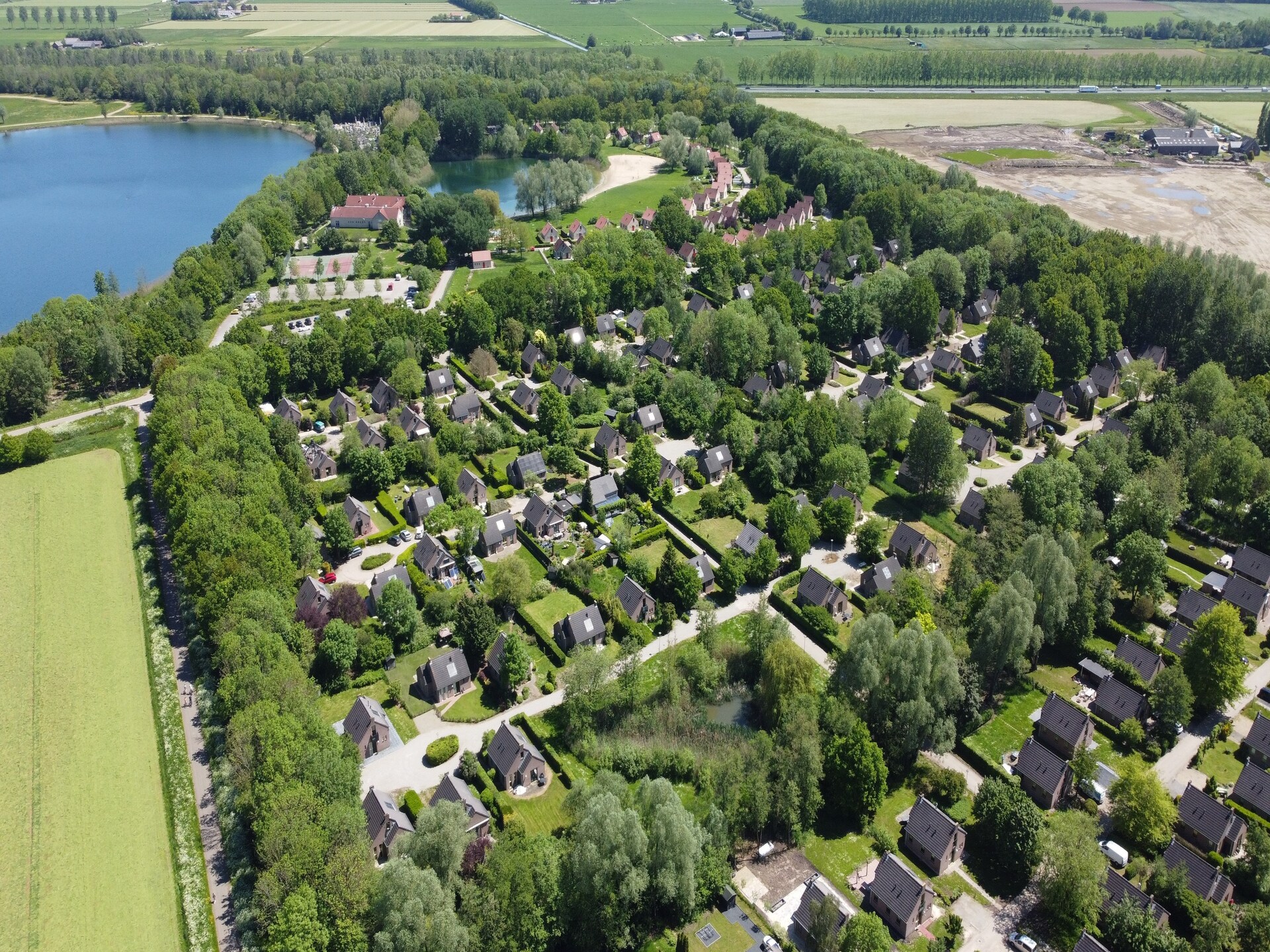 Vrijstaand vakantiehuis op 't Broeckhuys, aan recreatiemeer in Ewijk - foto 32